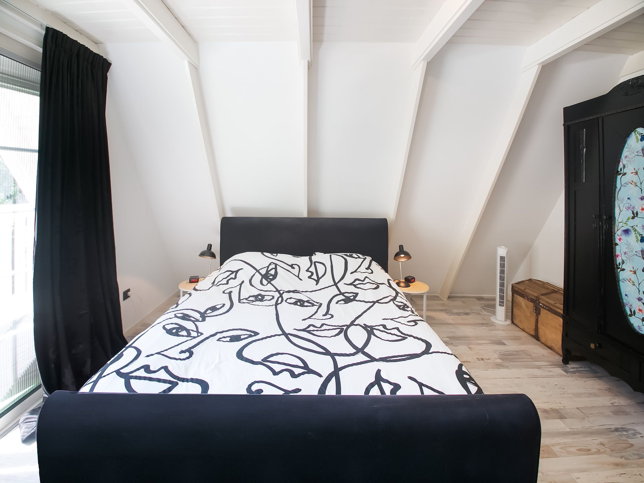 Een slaapkamer van Botterlodge in Wateren