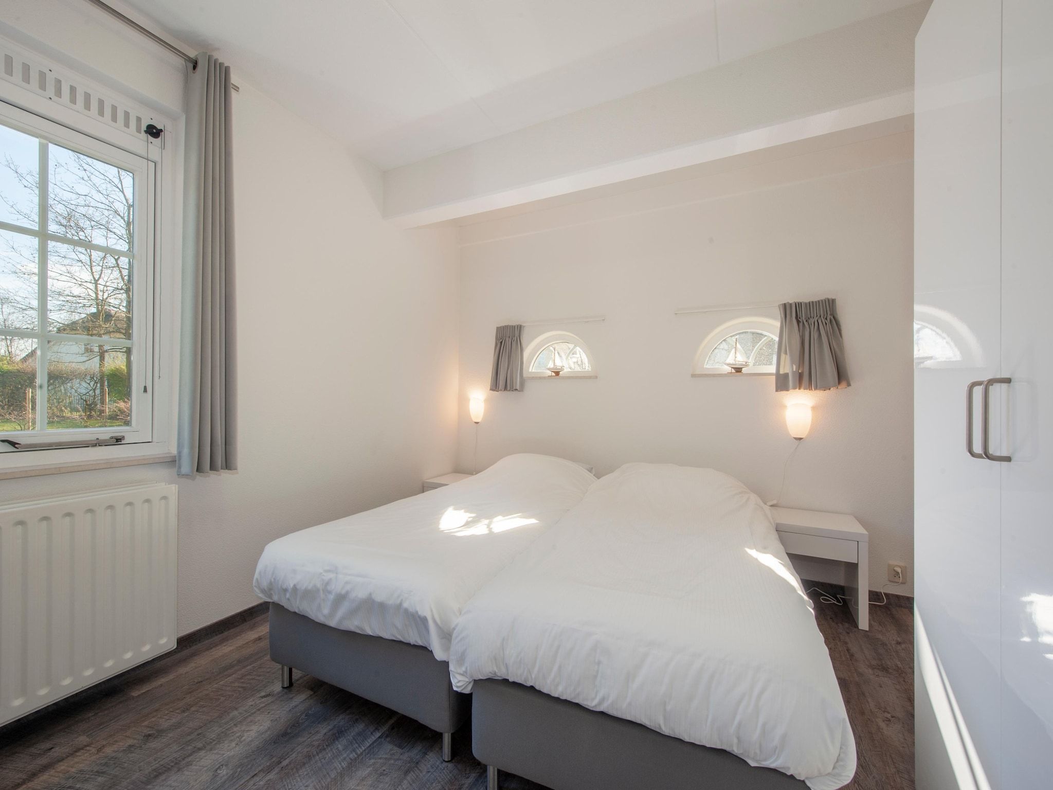 Een slaapkamer van Noordzee Résidence De Banjaard 16 in Kamperland