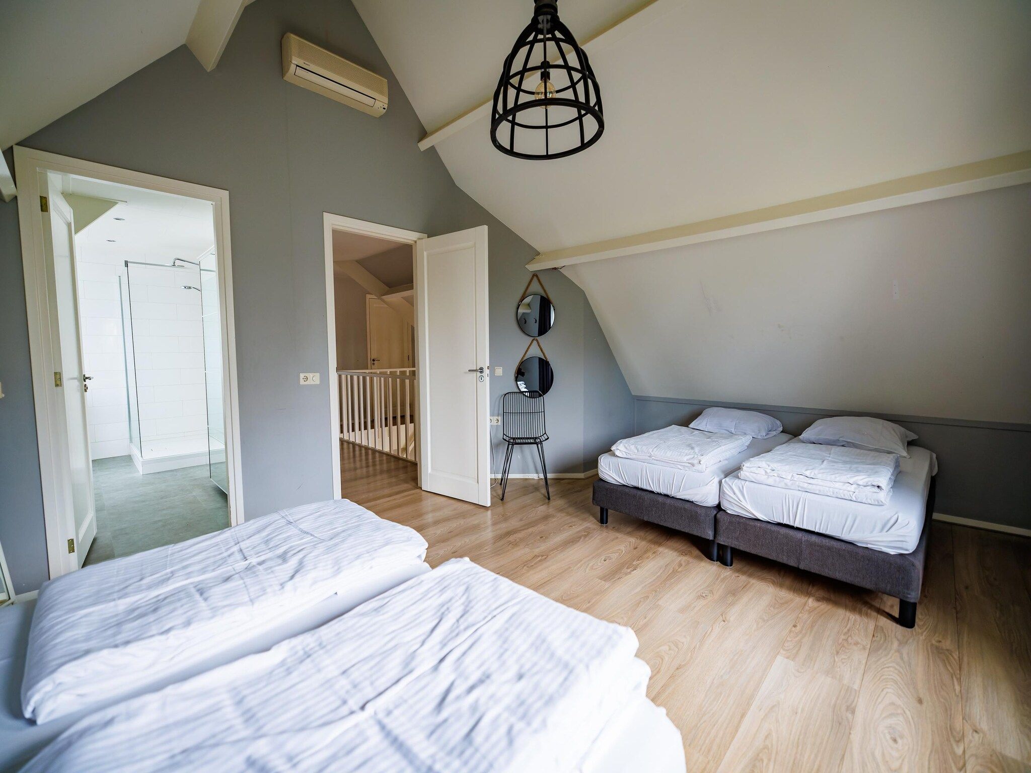 Een slaapkamer van Vakantiepark Eiland van Maurik 4 in Maurik