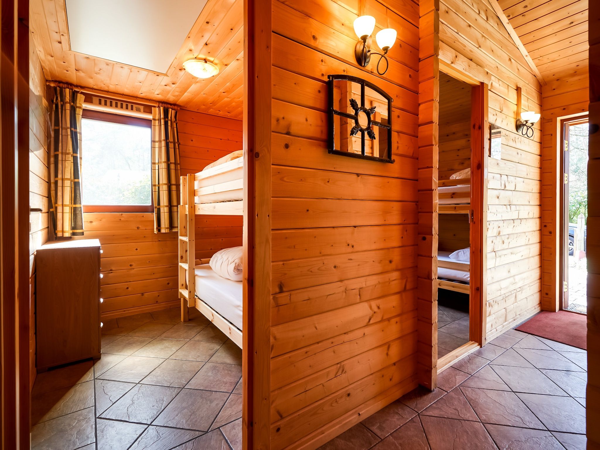 Een slaapkamer van Finse Bungalow in Holten in Holten