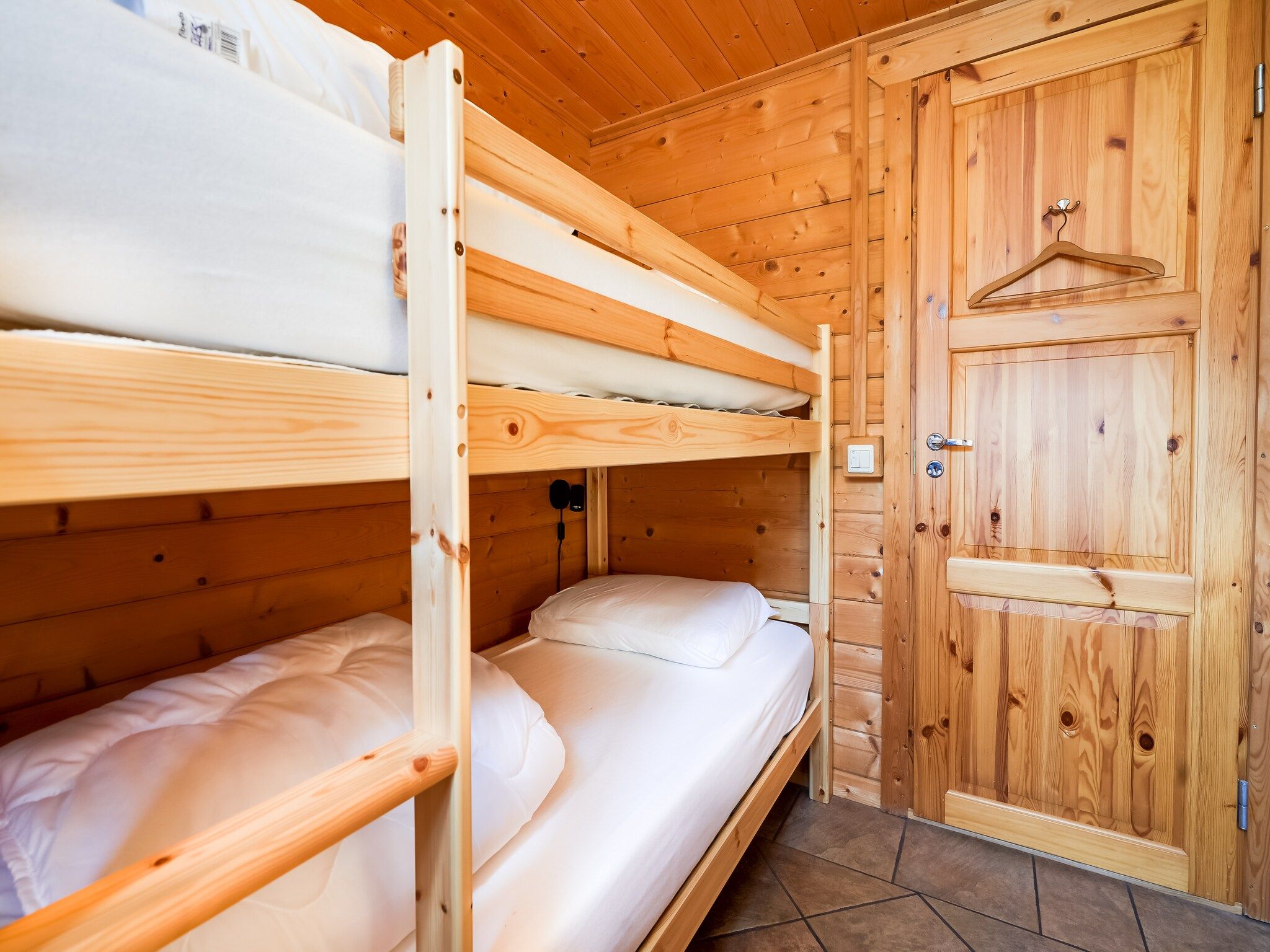 Een slaapkamer van Finse Bungalow in Holten in Holten