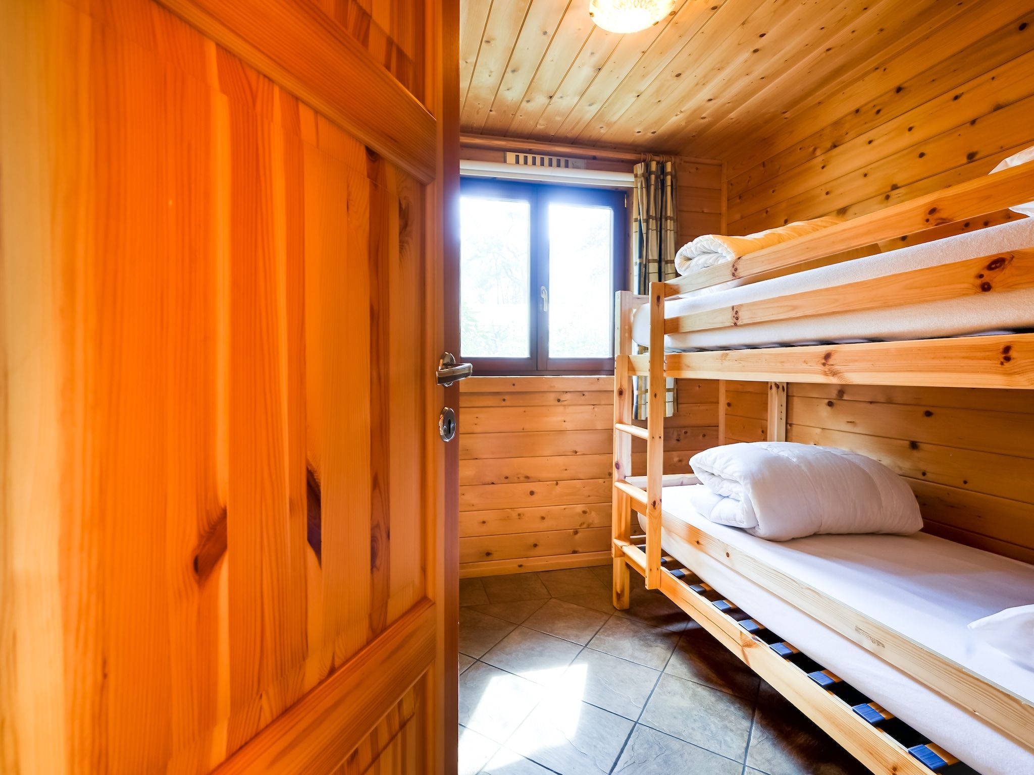 Een slaapkamer van Finse Bungalow in Holten in Holten