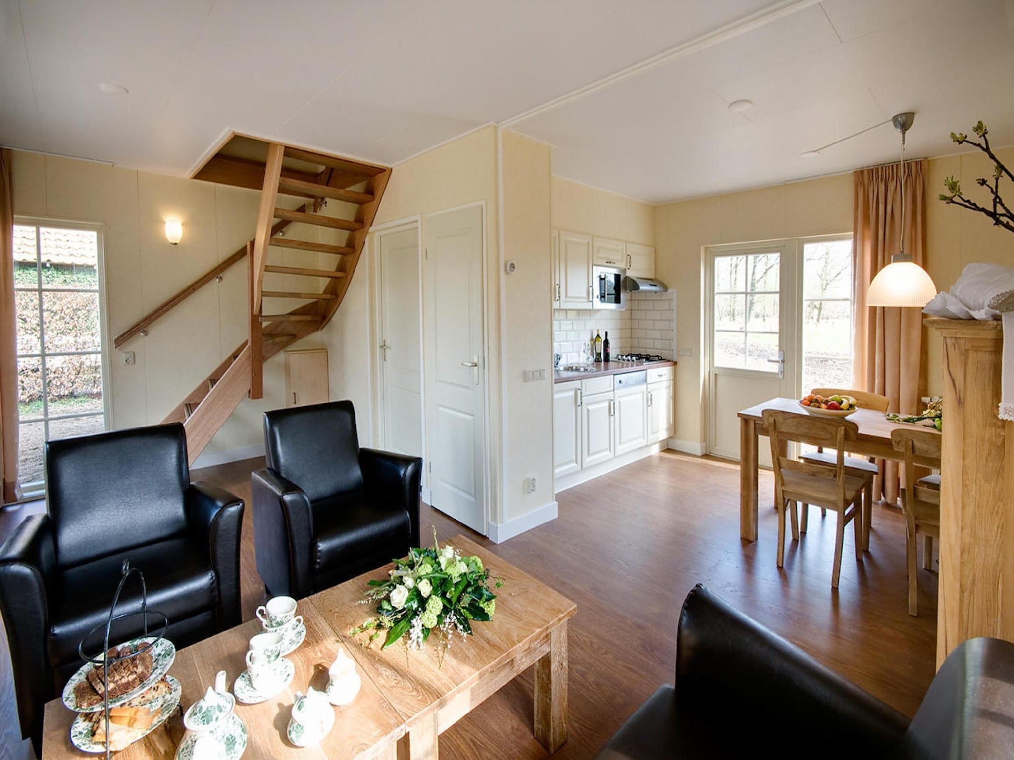 De woonkamer van De Grimberghoeve 1 in Notter