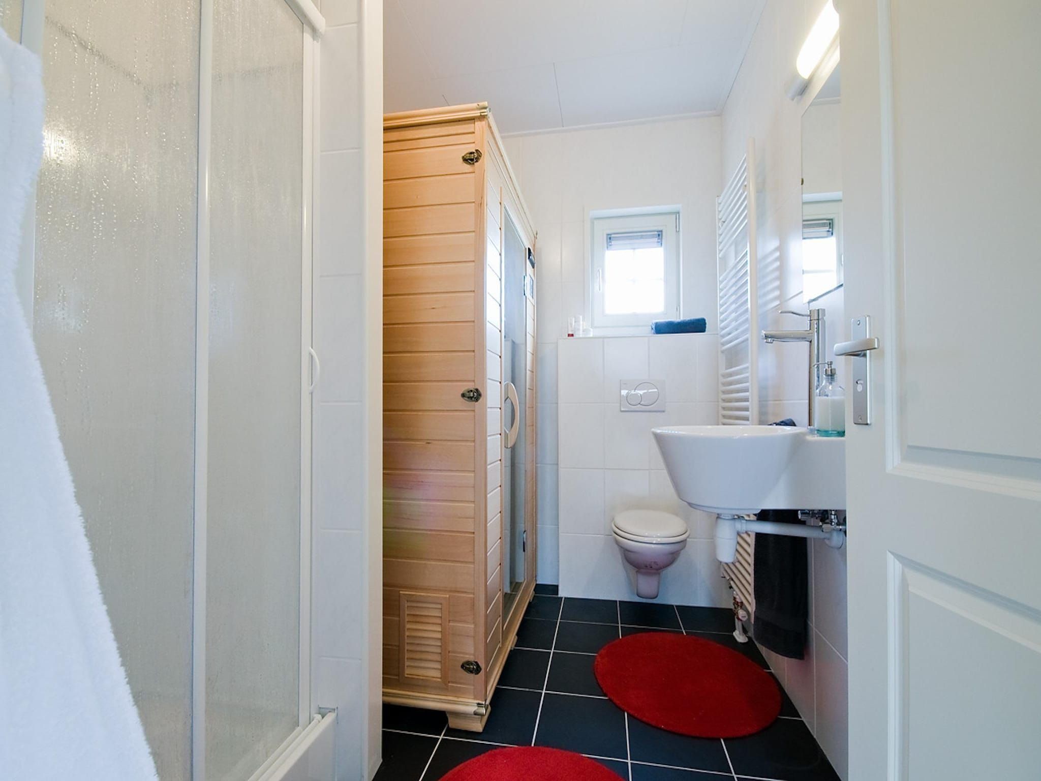 De badkamer van De Grimberghoeve 1 in Notter