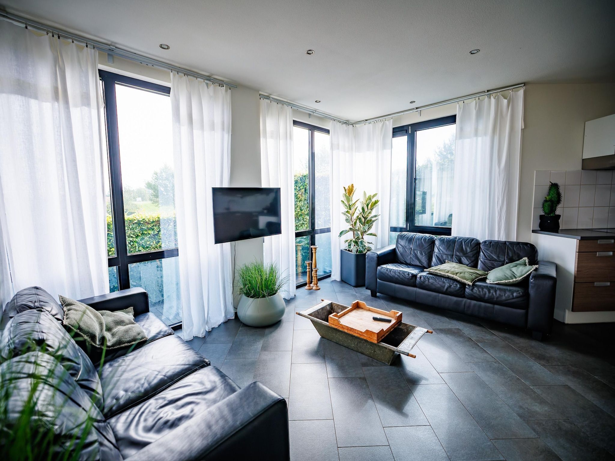 De woonkamer van Vakantiepark Eiland van Maurik 6 in Maurik