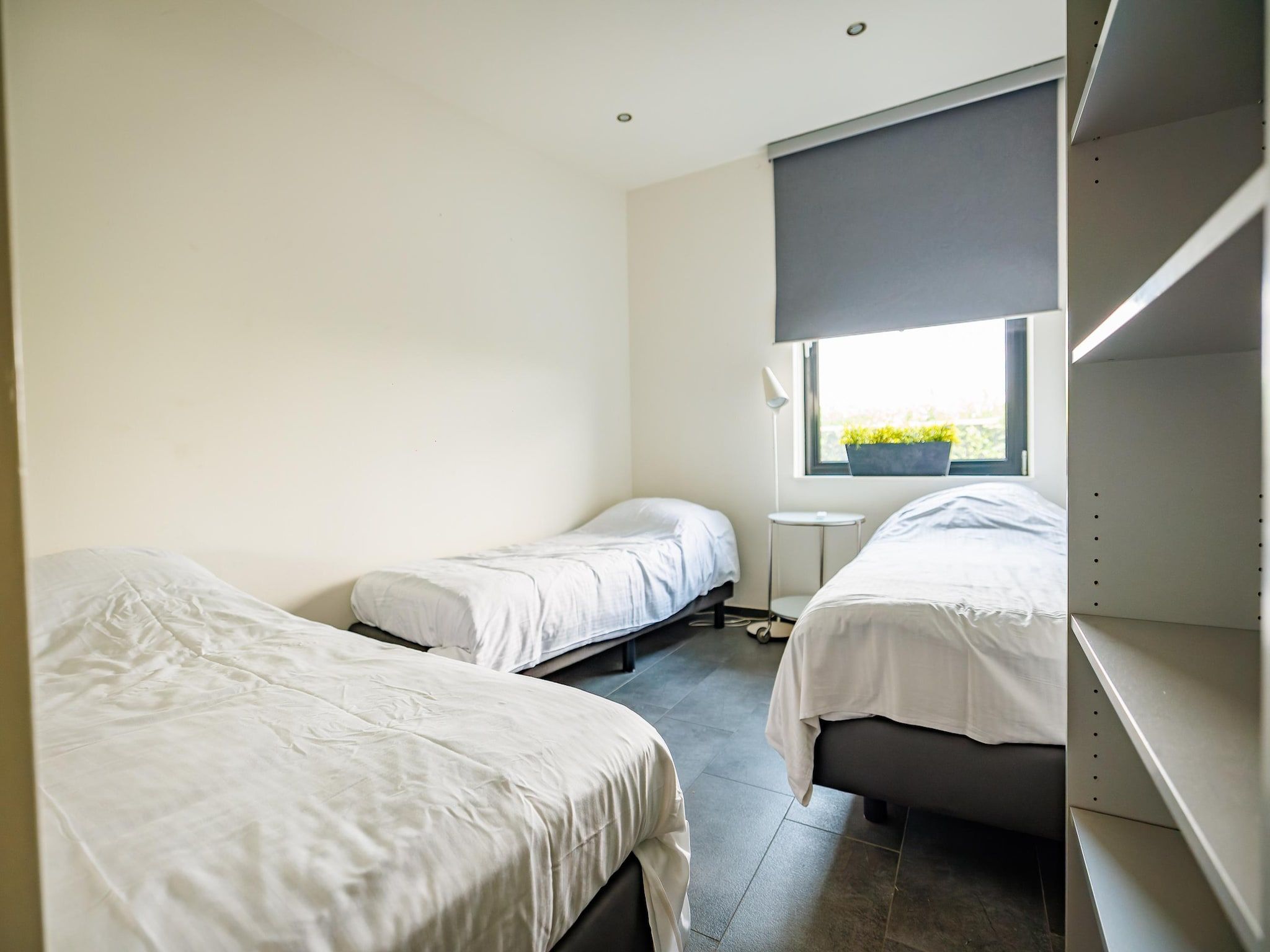 Een slaapkamer van Vakantiepark Eiland van Maurik 6 in Maurik