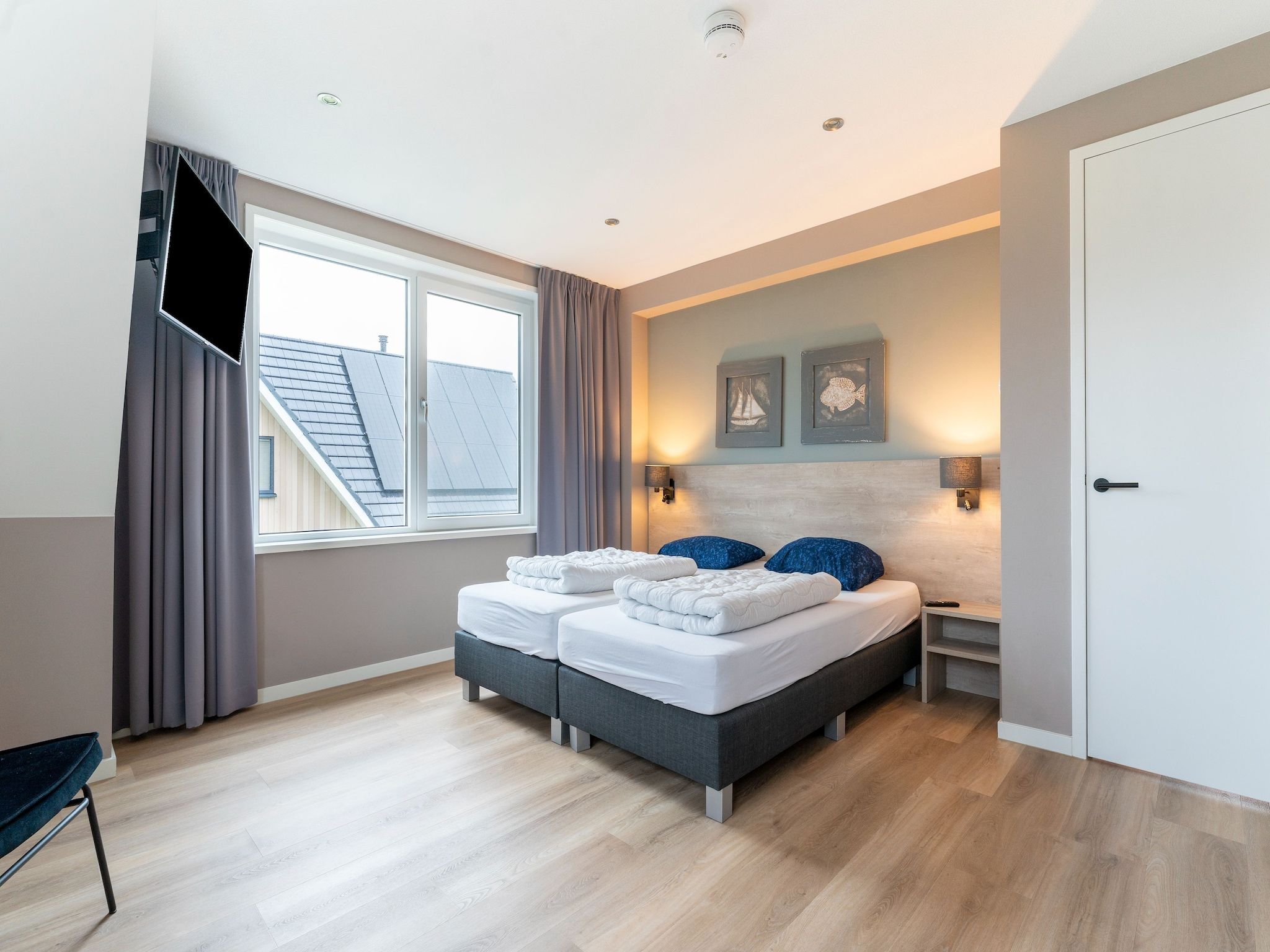 Een slaapkamer van So What 17 in De Koog Texel