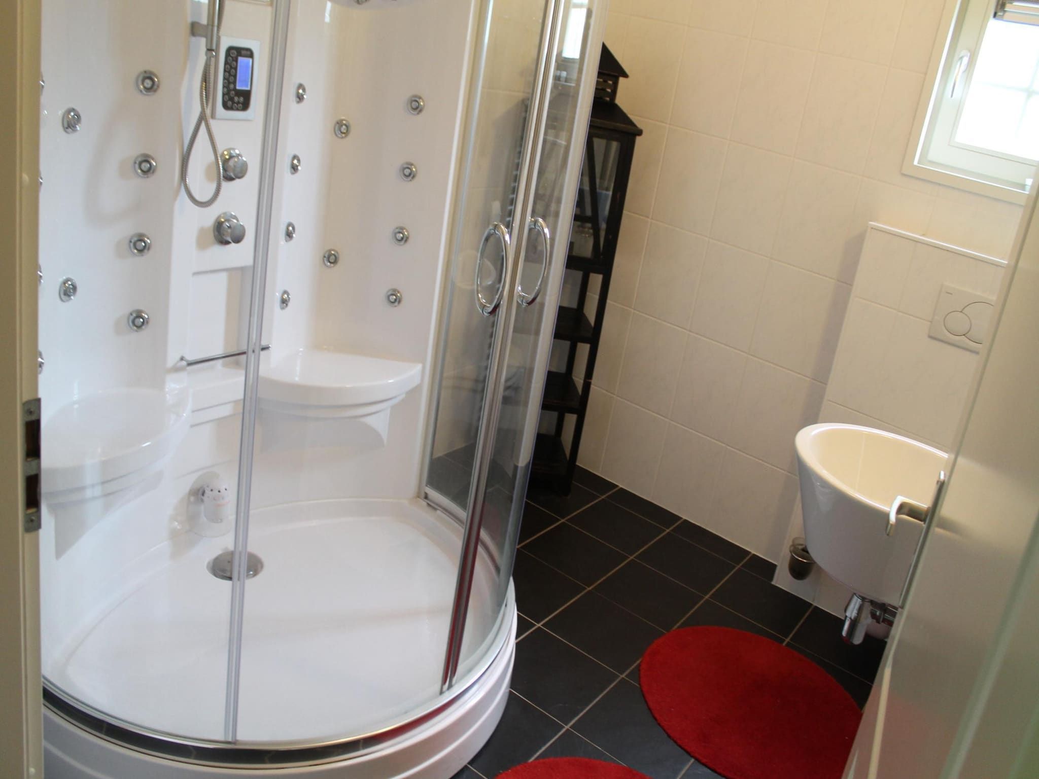 De badkamer van De Grimberghoeve 2 in Notter