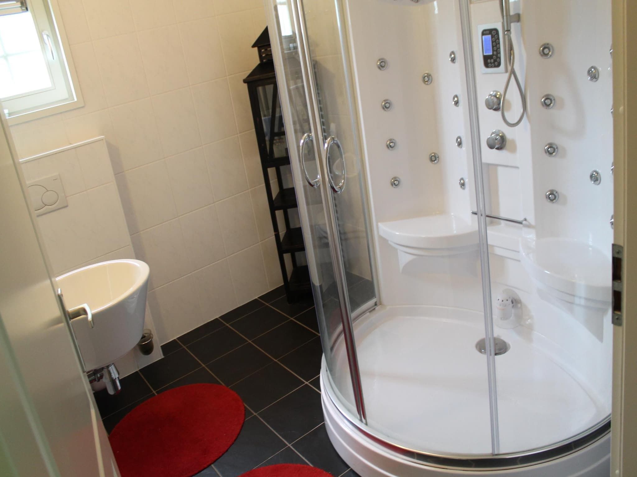 De badkamer van De Grimberghoeve 2 in Notter