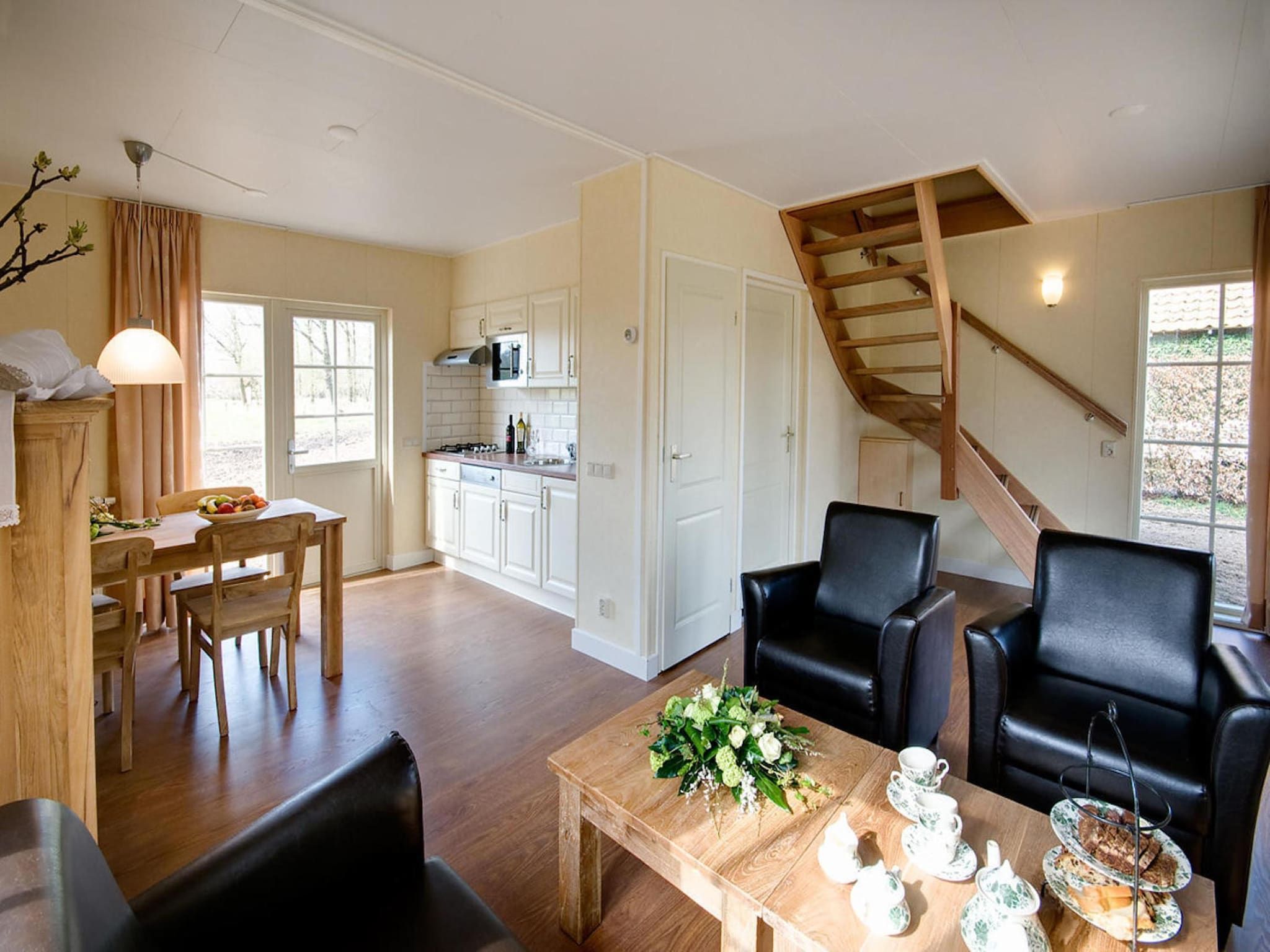 De woonkamer van De Grimberghoeve 2 in Notter