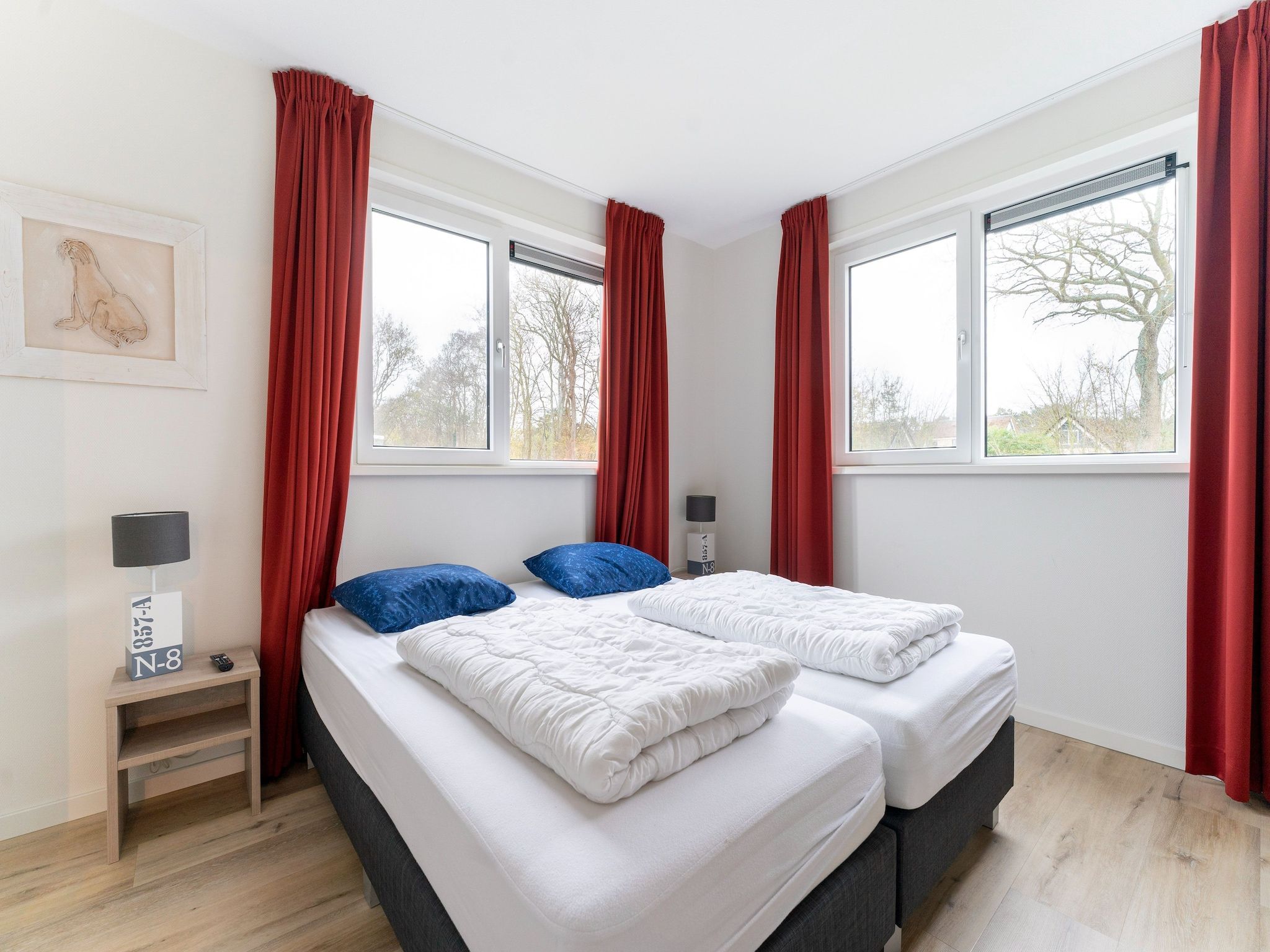 Een slaapkamer van So What 21 in De Koog Texel