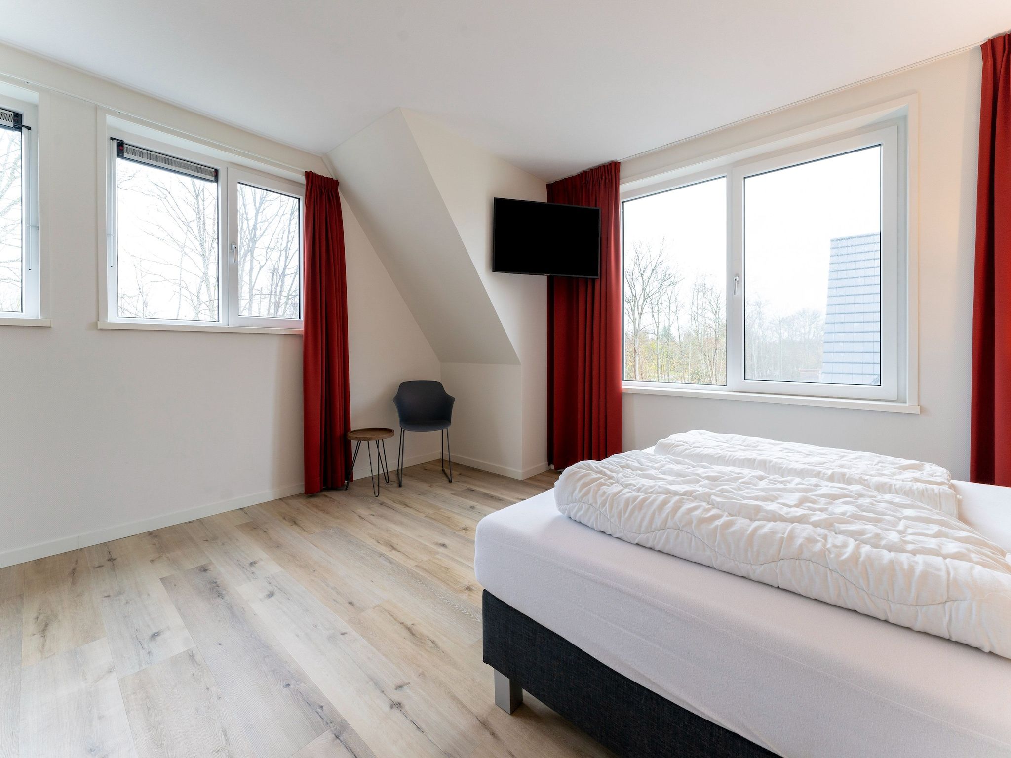 Een slaapkamer van So What 21 in De Koog Texel