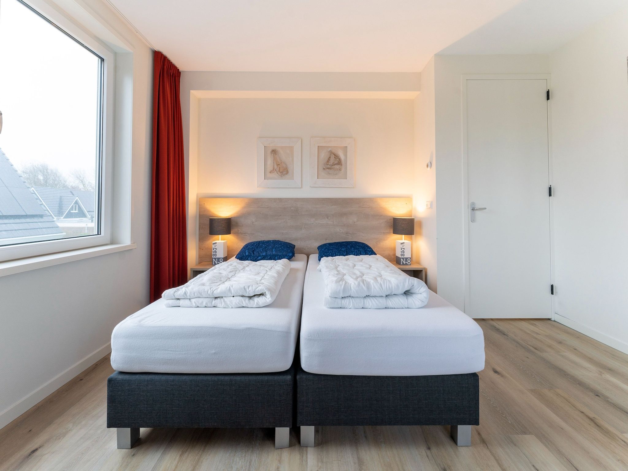 Een slaapkamer van So What 21 in De Koog Texel