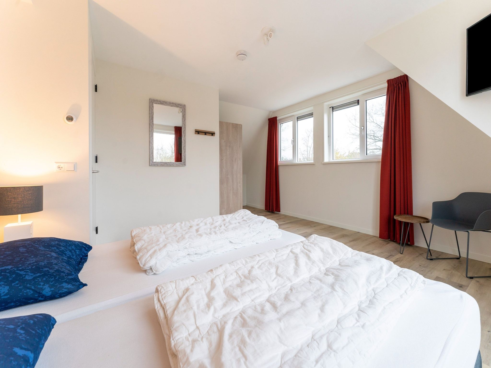 Een slaapkamer van So What 21 in De Koog Texel