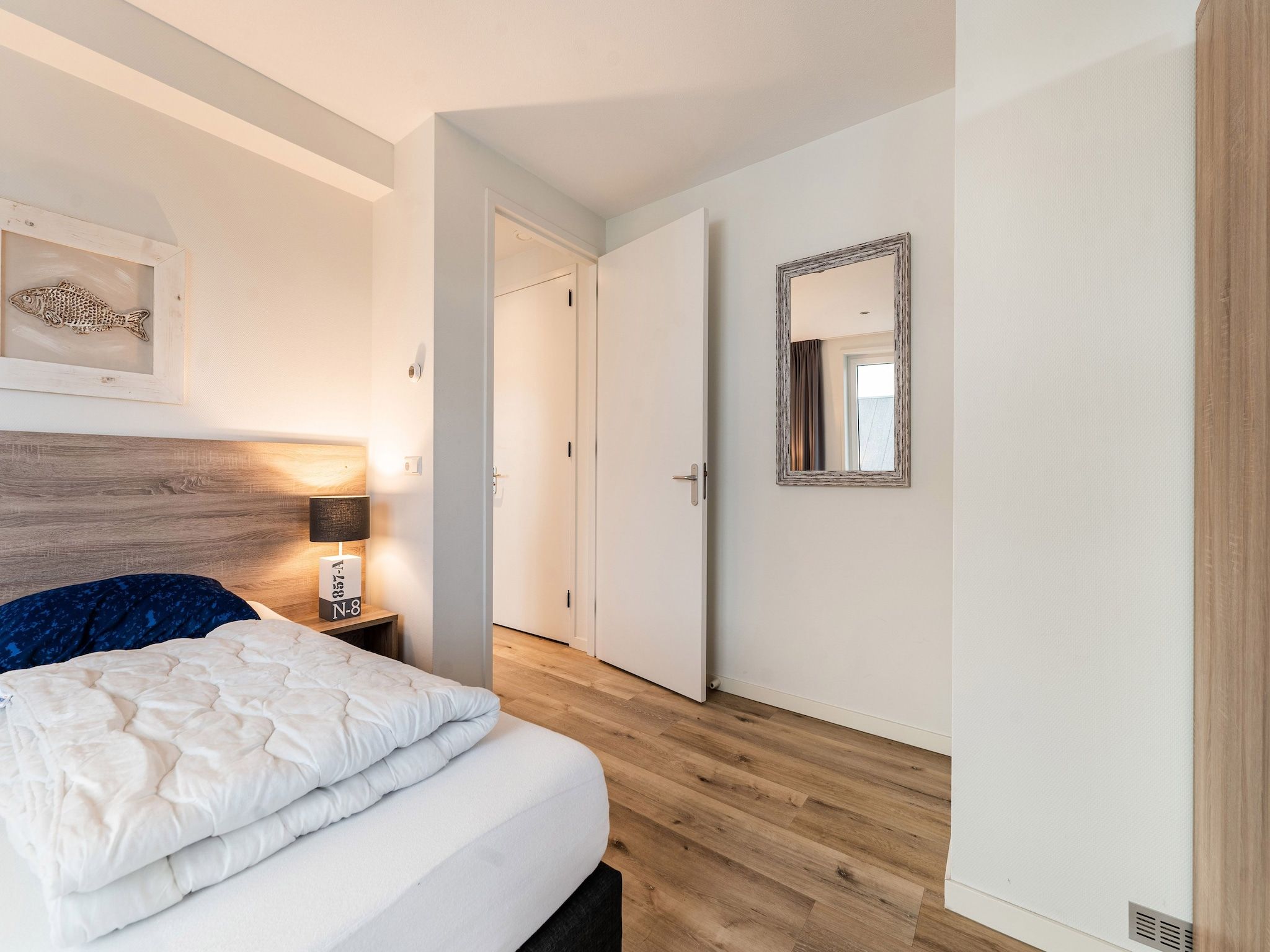 Een slaapkamer van So What 21A in De Koog Texel