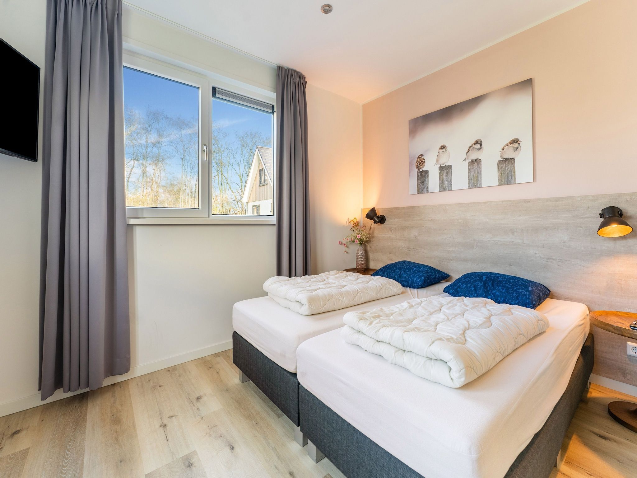 Een slaapkamer van So What 35A in De Koog Texel