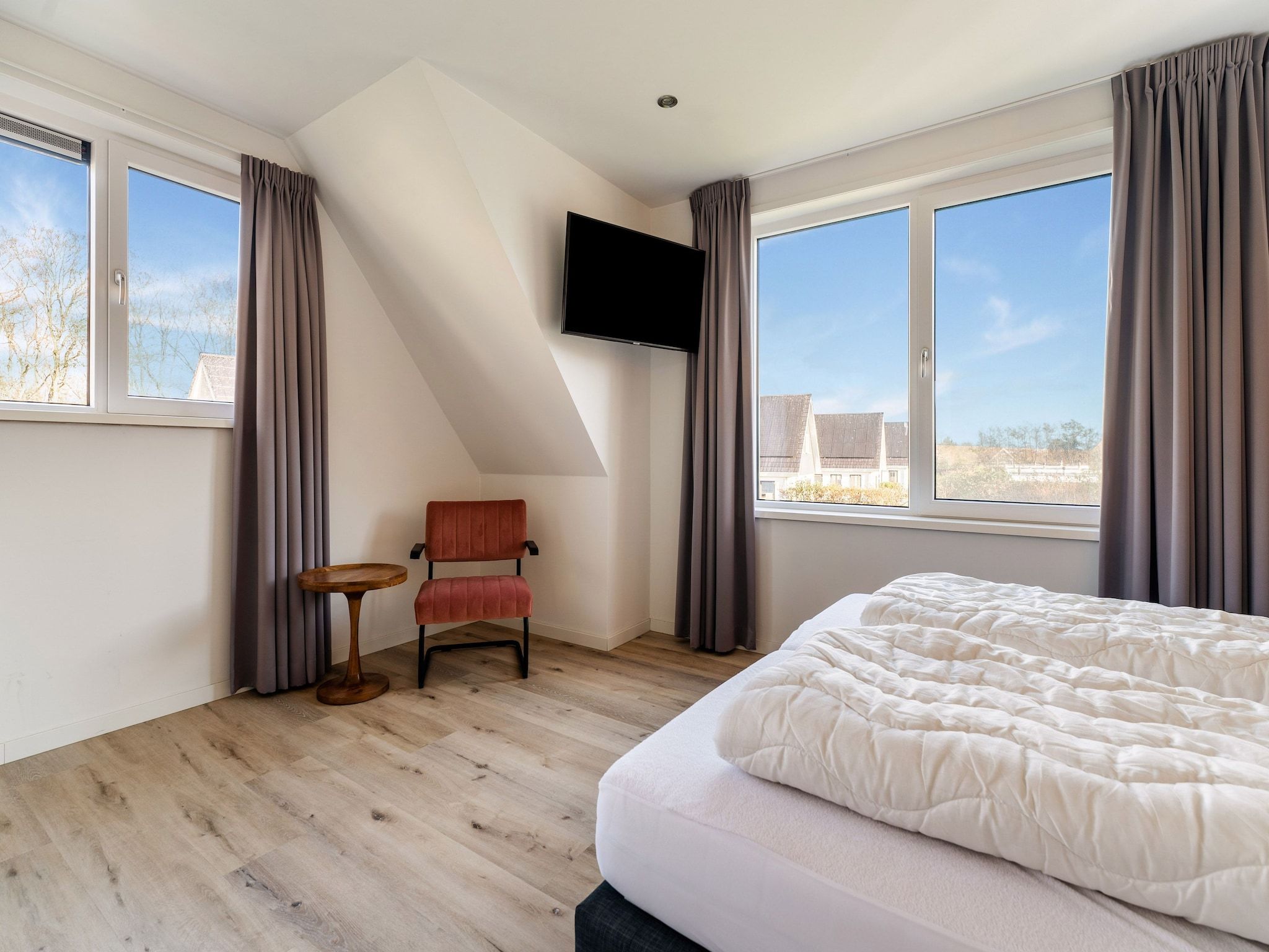 Een slaapkamer van So What 35A in De Koog Texel