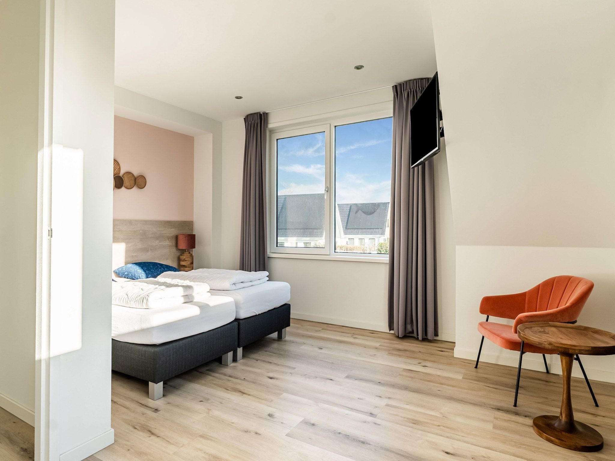 Een slaapkamer van So What 35A in De Koog Texel