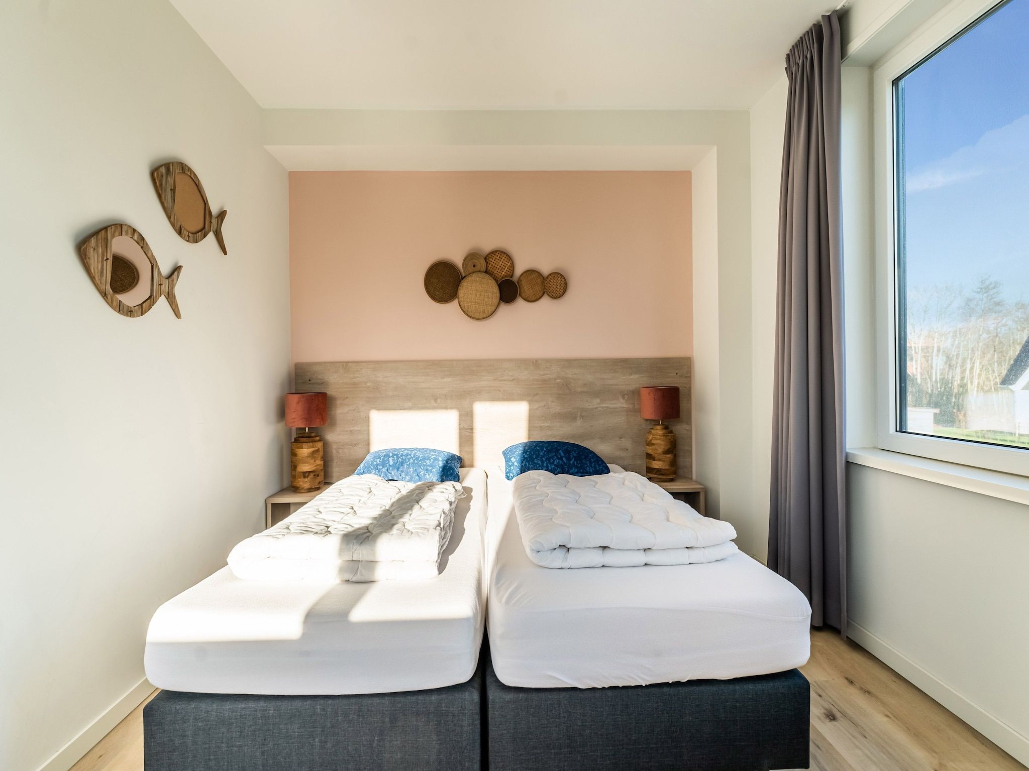 Een slaapkamer van So What 35A in De Koog Texel