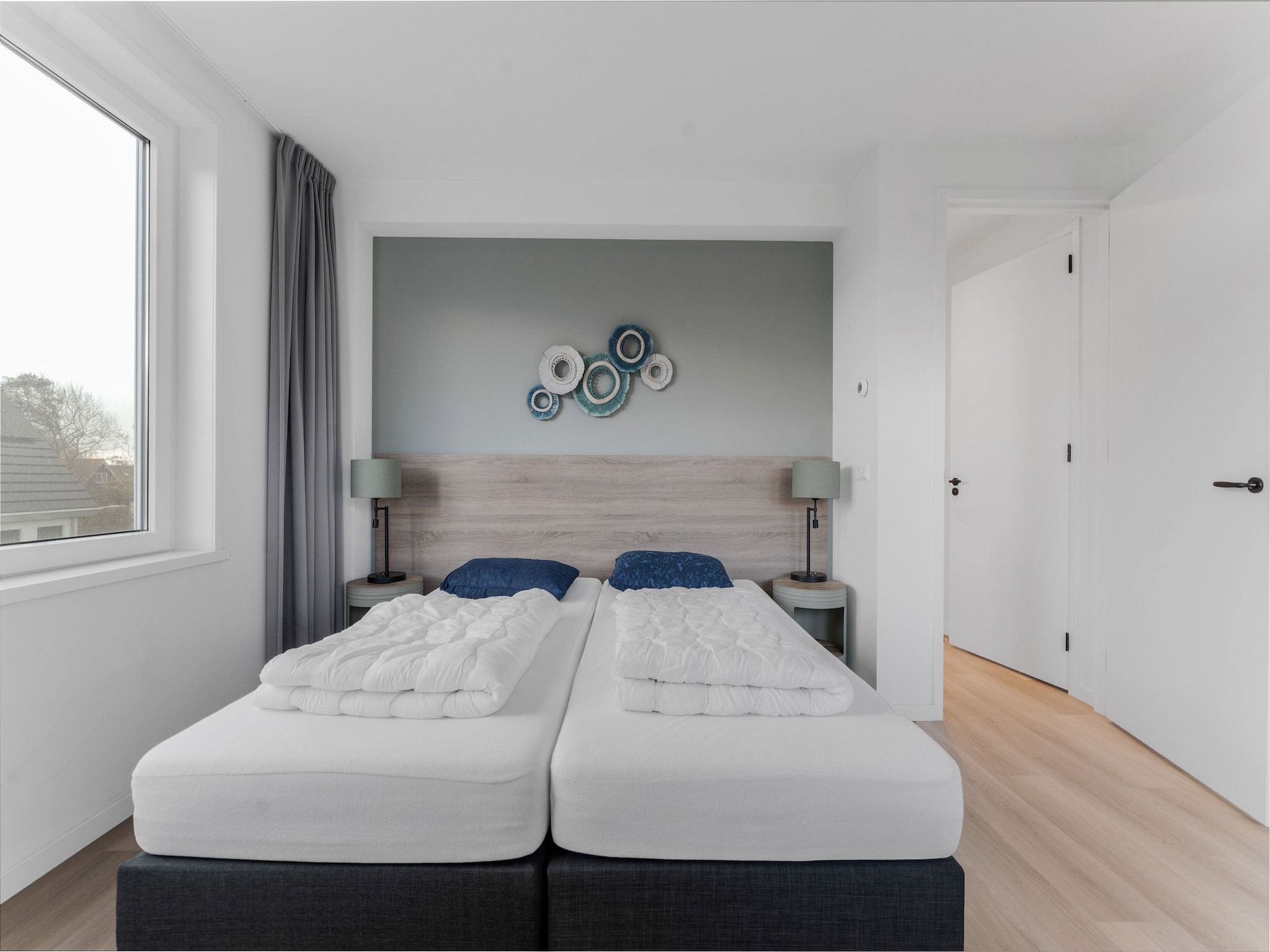 Een slaapkamer van So What 37A in De Koog Texel