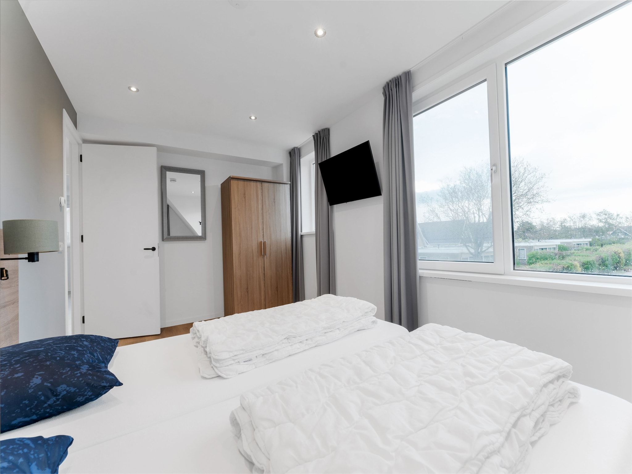 Een slaapkamer van So What 37A in De Koog Texel