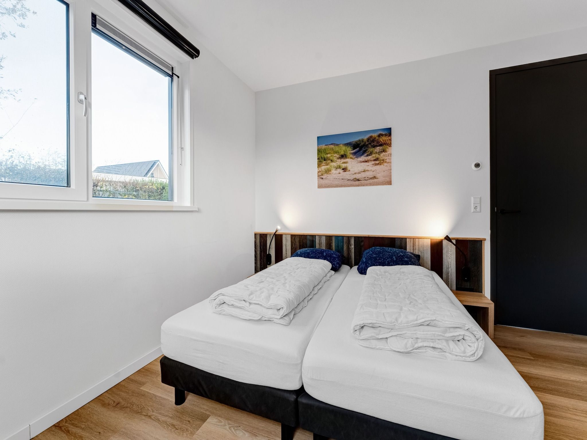 Een slaapkamer van So What 37 in De Koog Texel