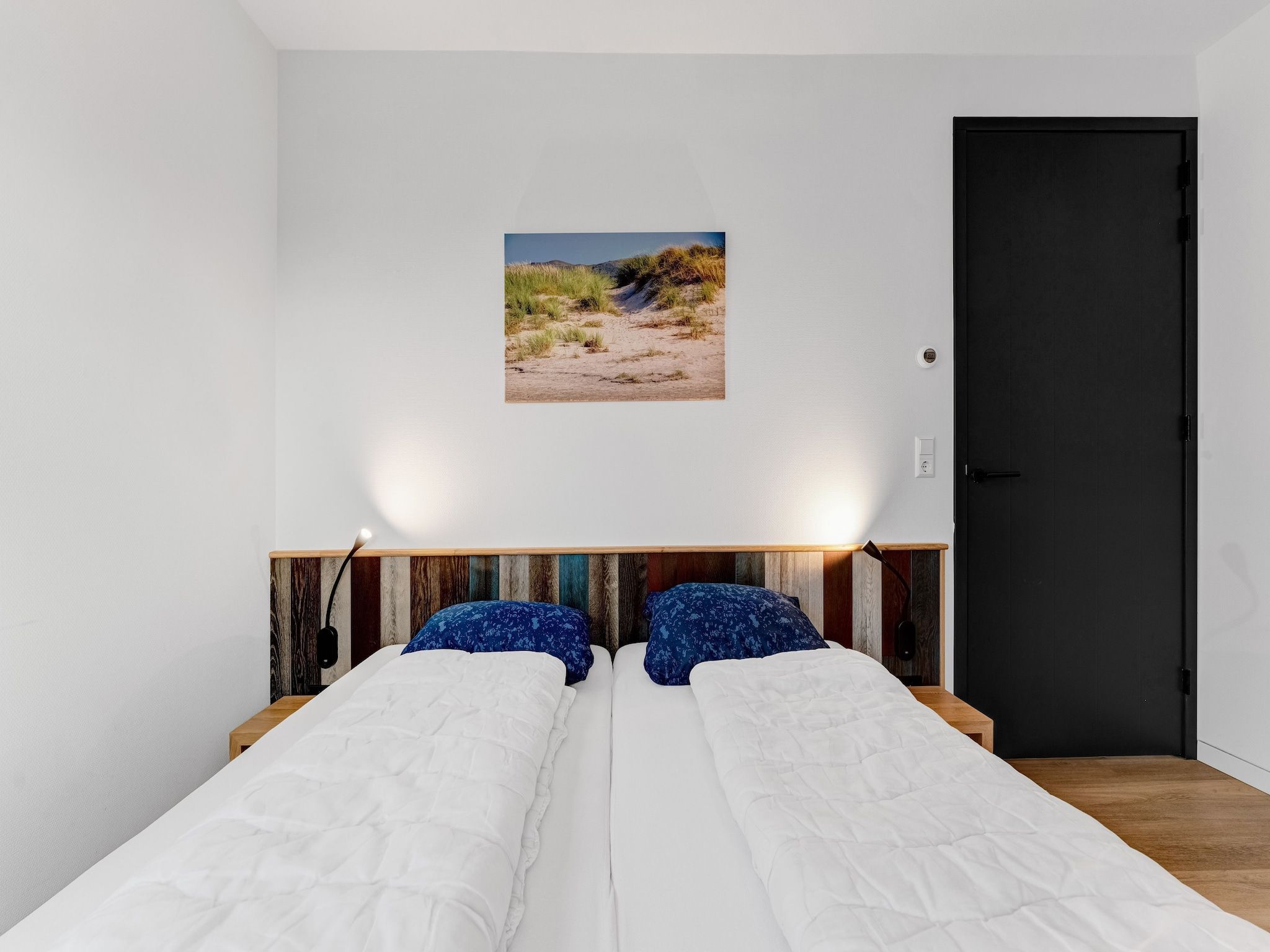 Een slaapkamer van So What 37 in De Koog Texel