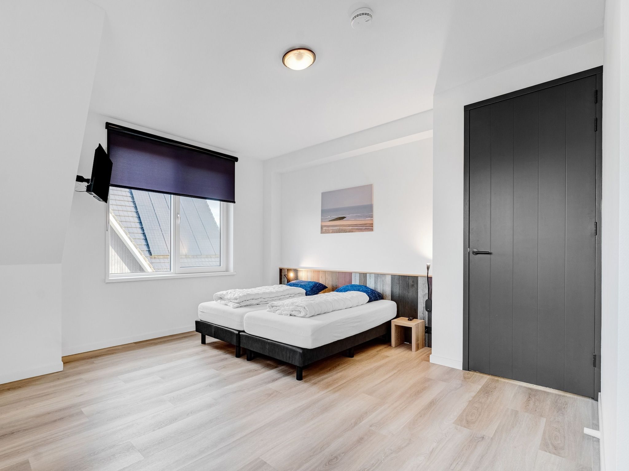 Een slaapkamer van So What 37 in De Koog Texel