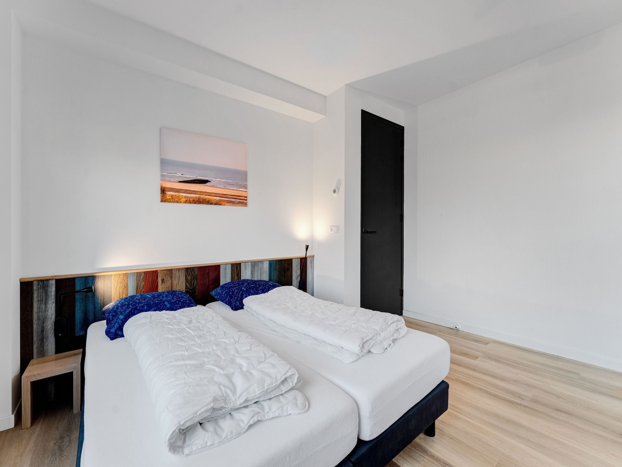 Een slaapkamer van So What 37 in De Koog Texel