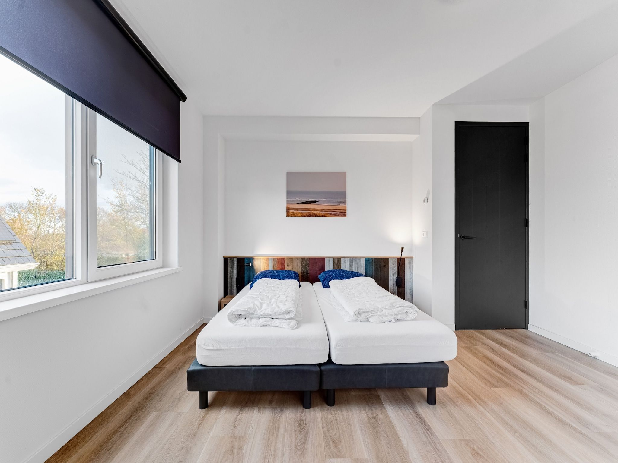 Een slaapkamer van So What 37 in De Koog Texel