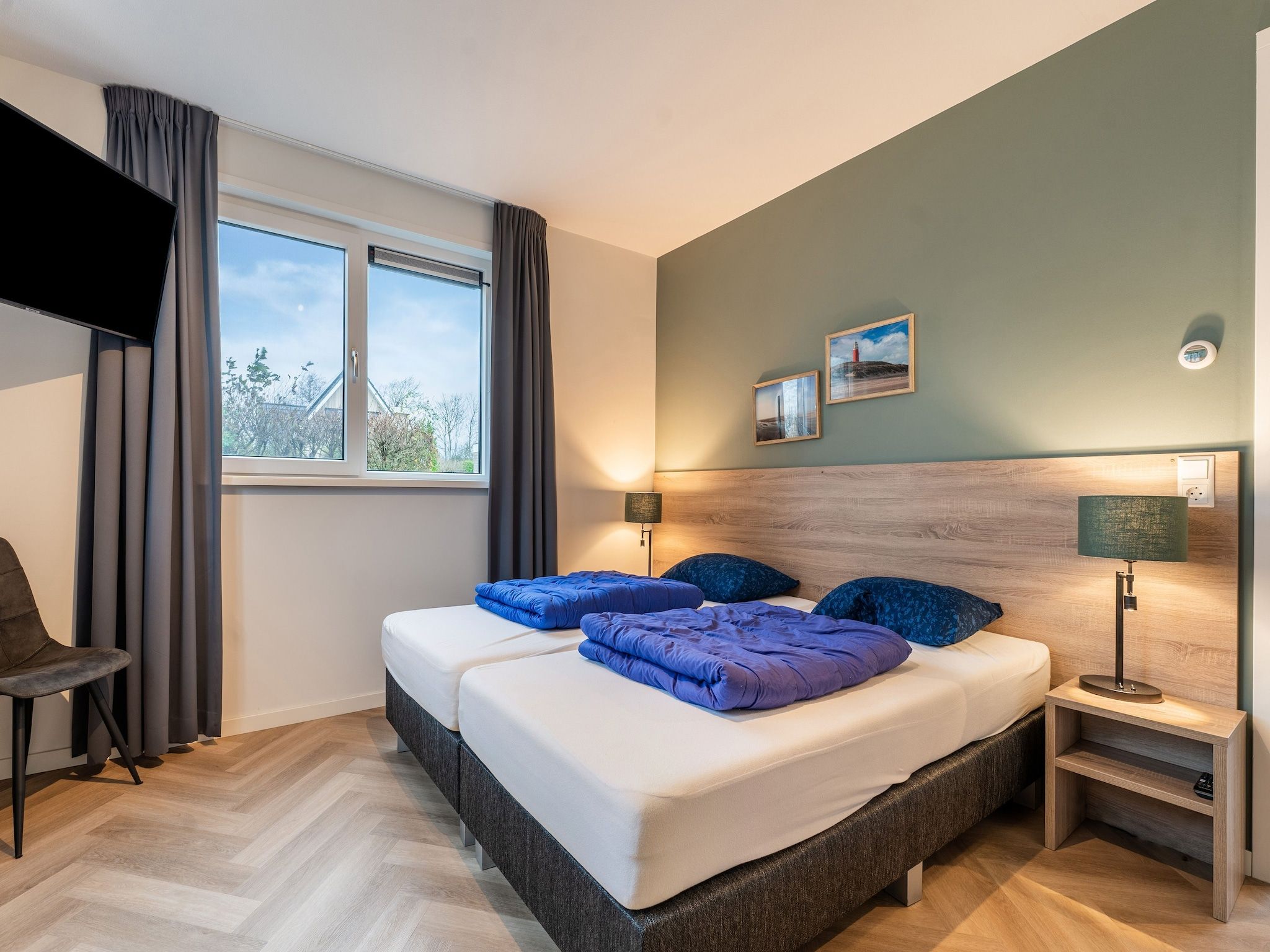 Een slaapkamer van So What 39 in De Koog Texel