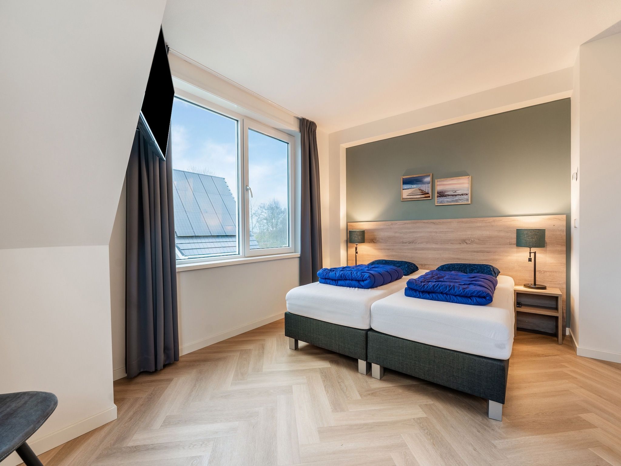 Een slaapkamer van So What 39 in De Koog Texel