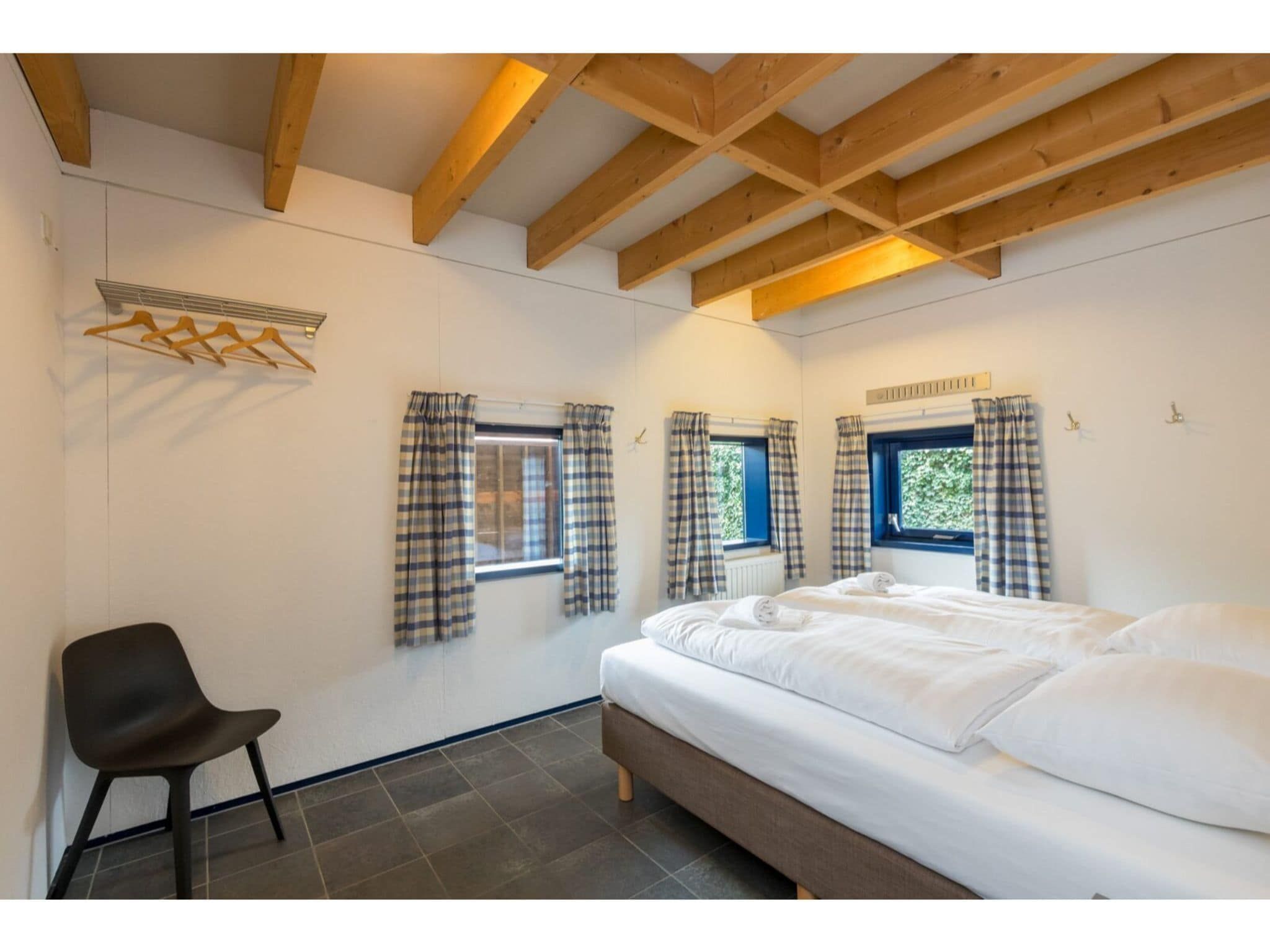 Een slaapkamer van Zonnevylle Duinweg 135 in Zoutelande