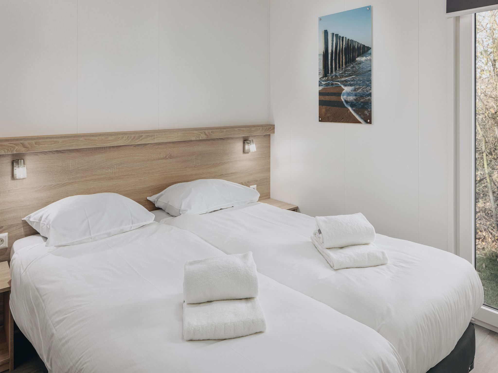 Een slaapkamer van Vakantiepark Hof Domburg 19 in Domburg