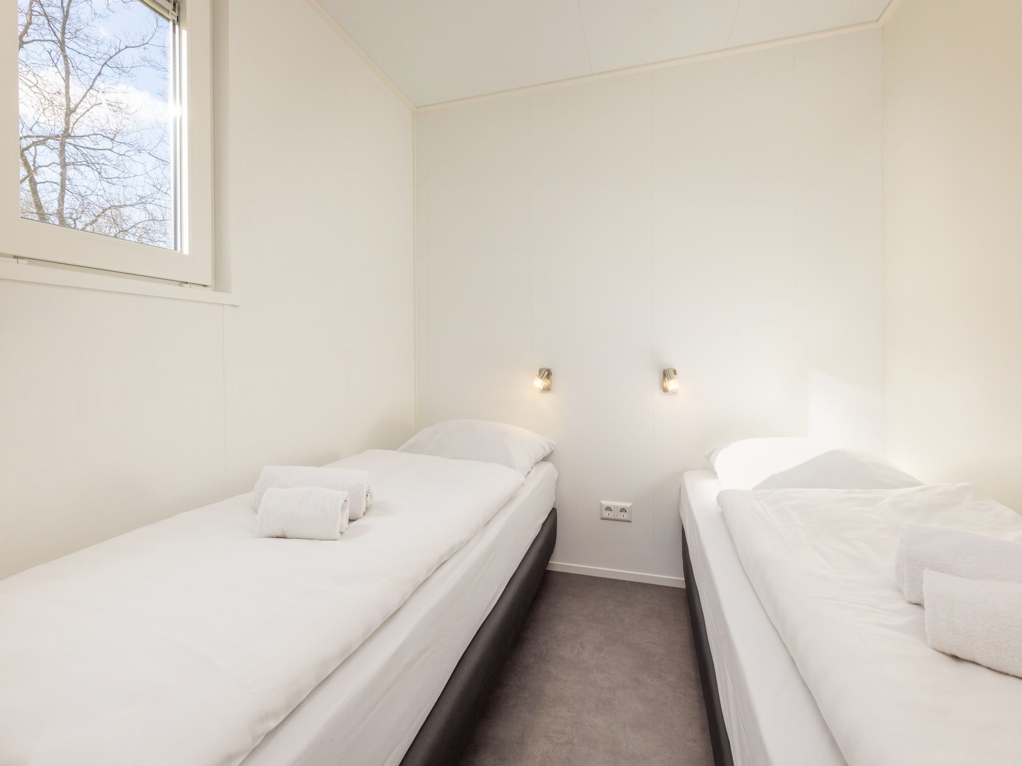 Een slaapkamer van Hunzepark 12 in Gasselternijveen