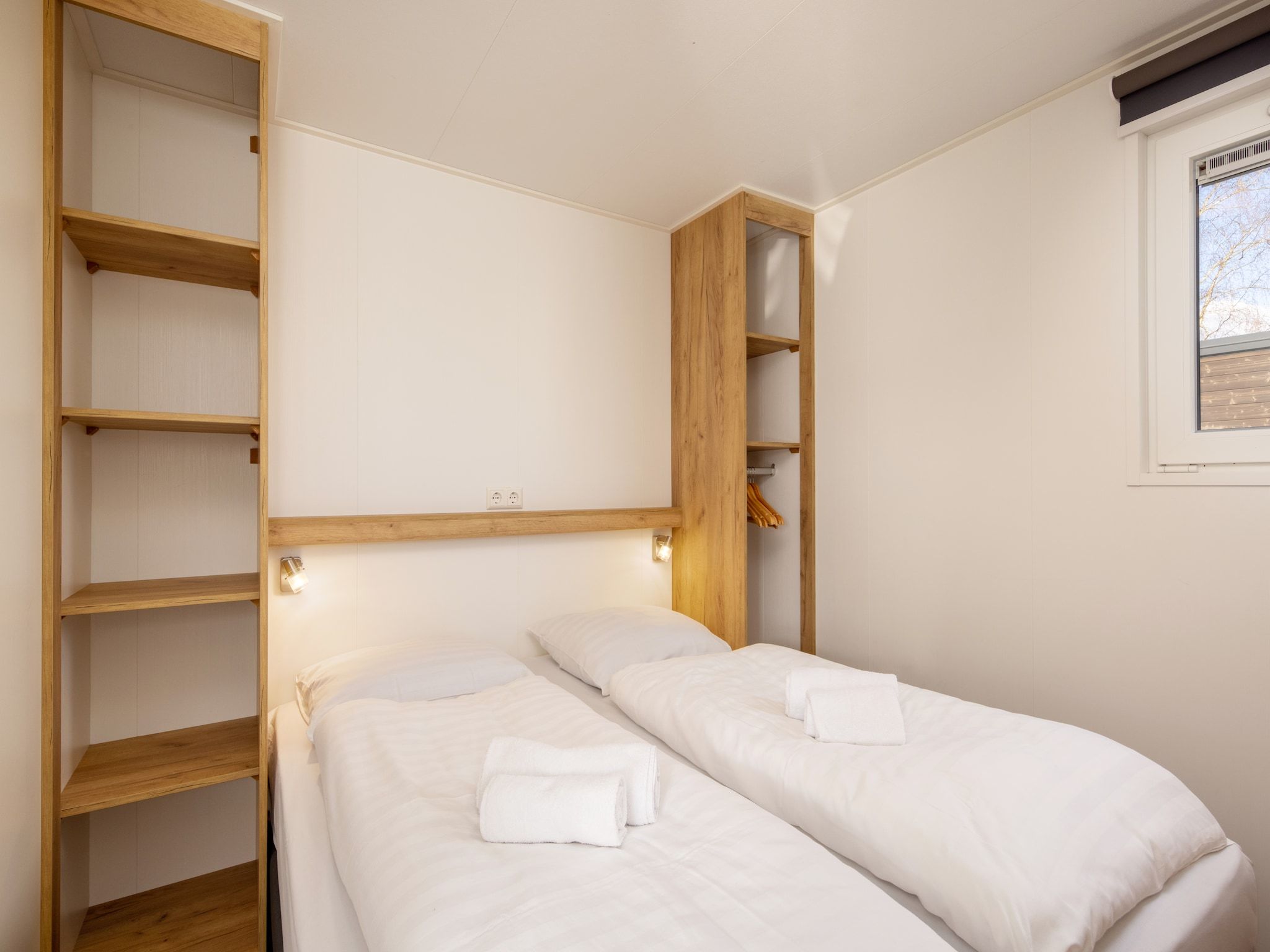 Een slaapkamer van Hunzepark 12 in Gasselternijveen