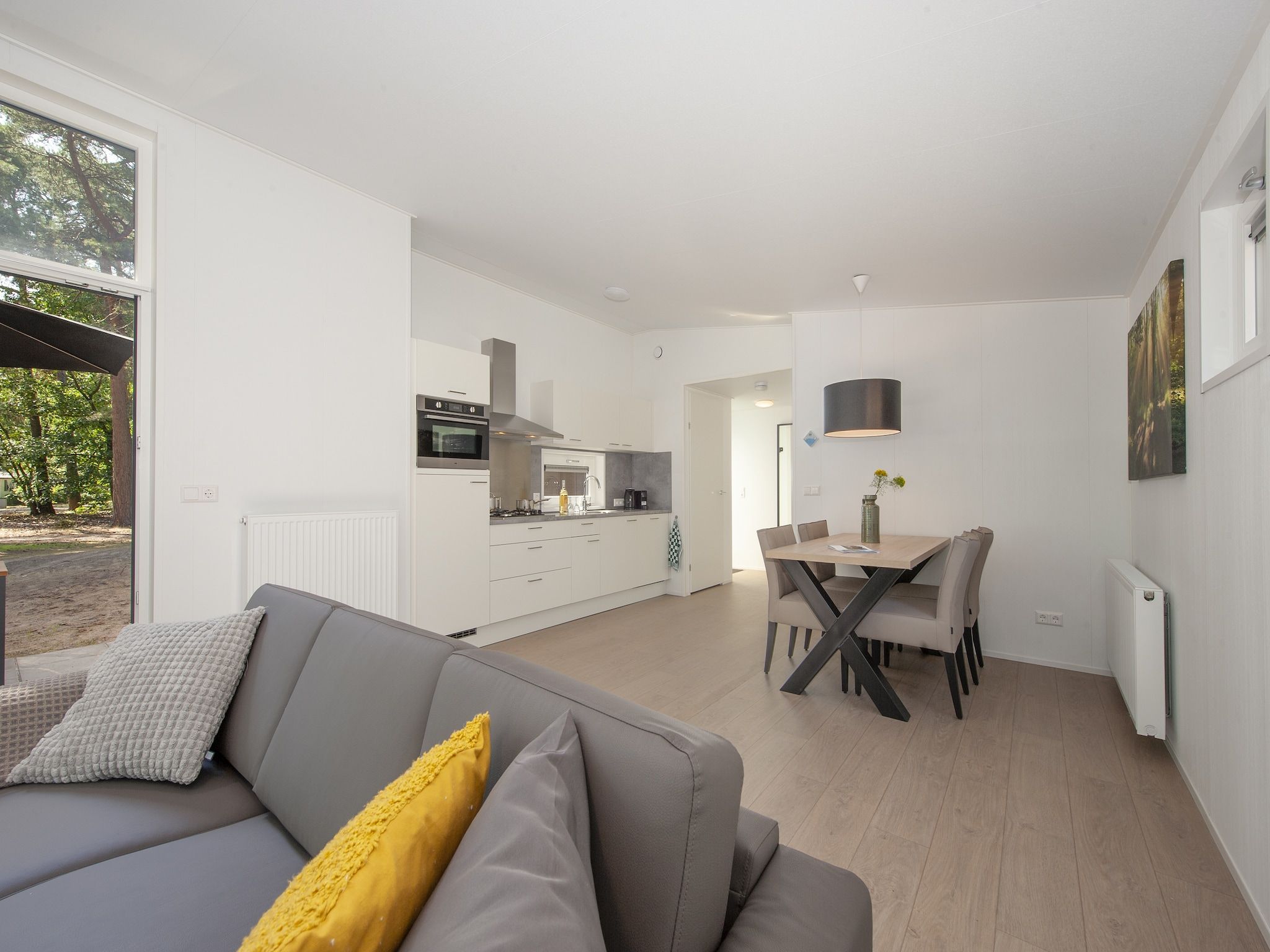 De woonkamer van Bospark 't Wolfsven 10 in Mierlo