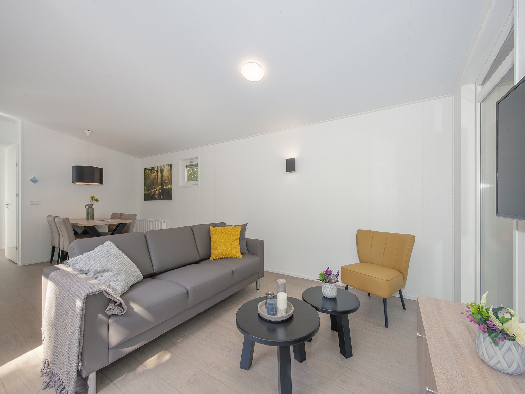 De woonkamer van Bospark 't Wolfsven 10 in Mierlo