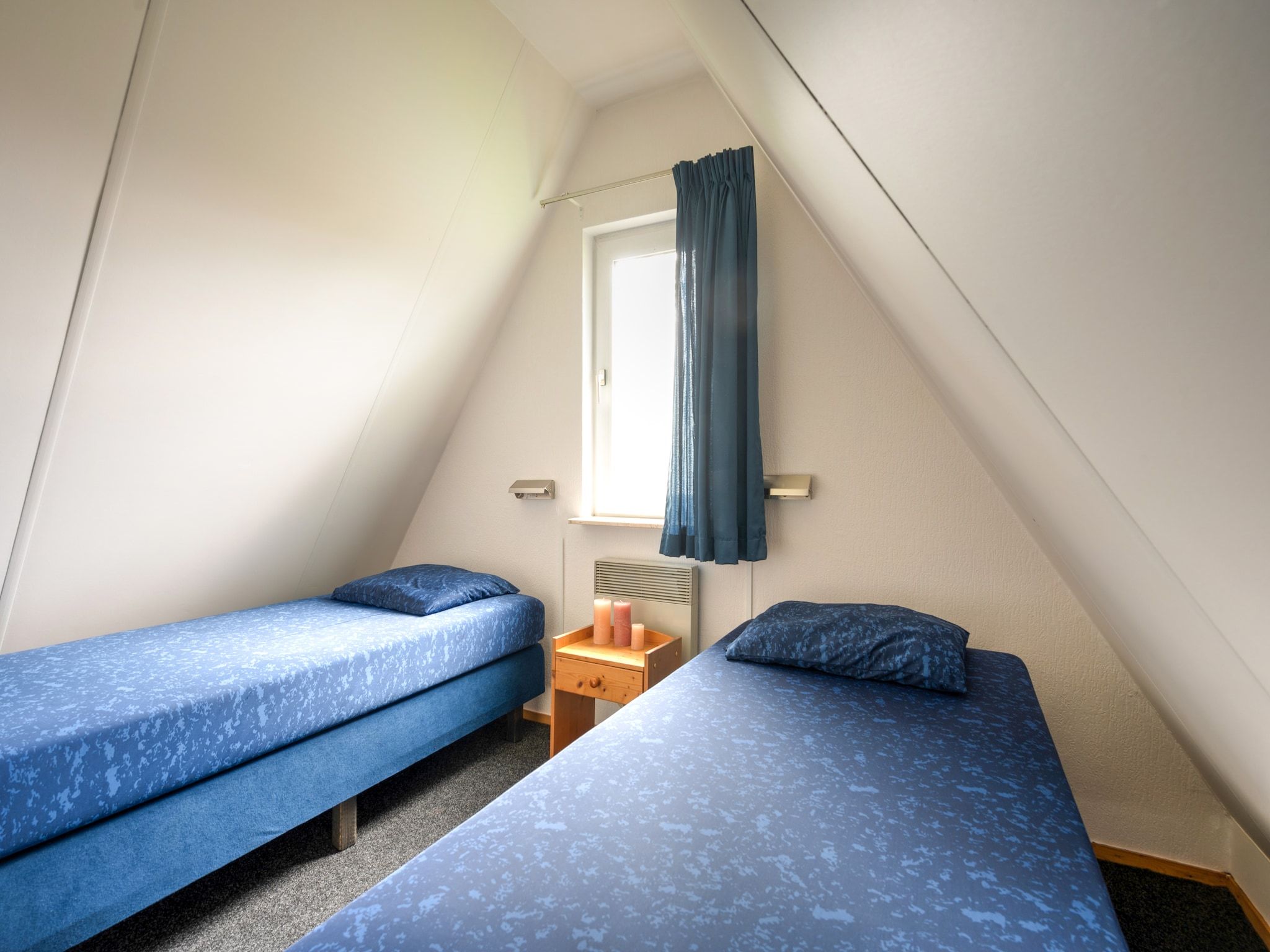 Een slaapkamer van Boslaan 1 in Gramsbergen
