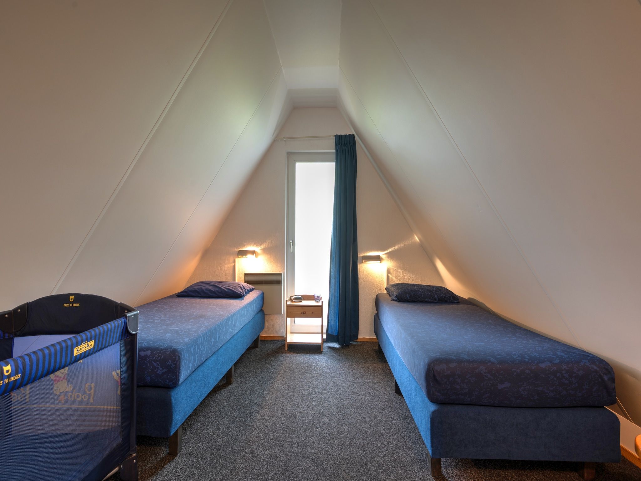 Een slaapkamer van Boslaan 1 in Gramsbergen