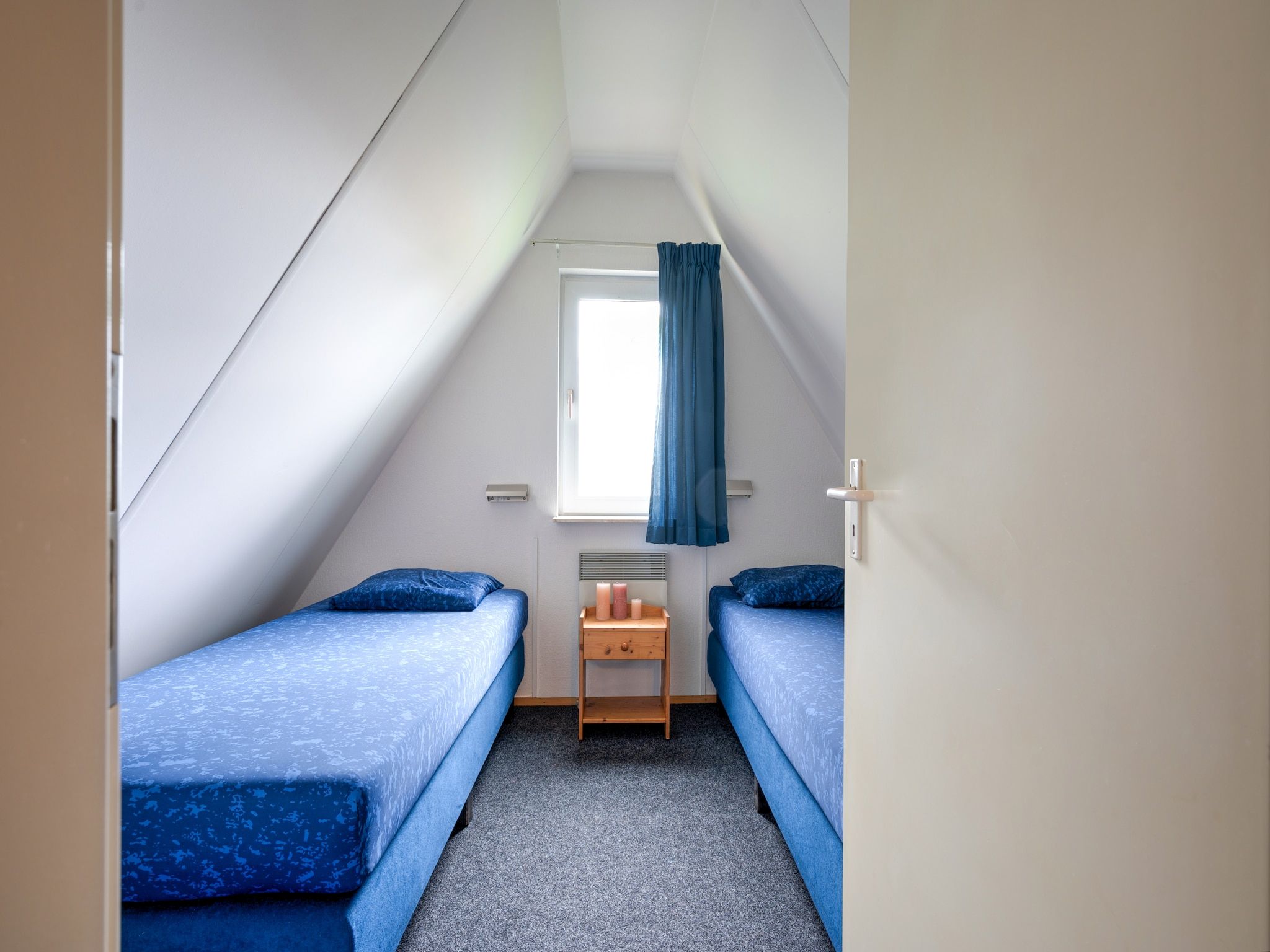 Een slaapkamer van Boslaan 1 in Gramsbergen