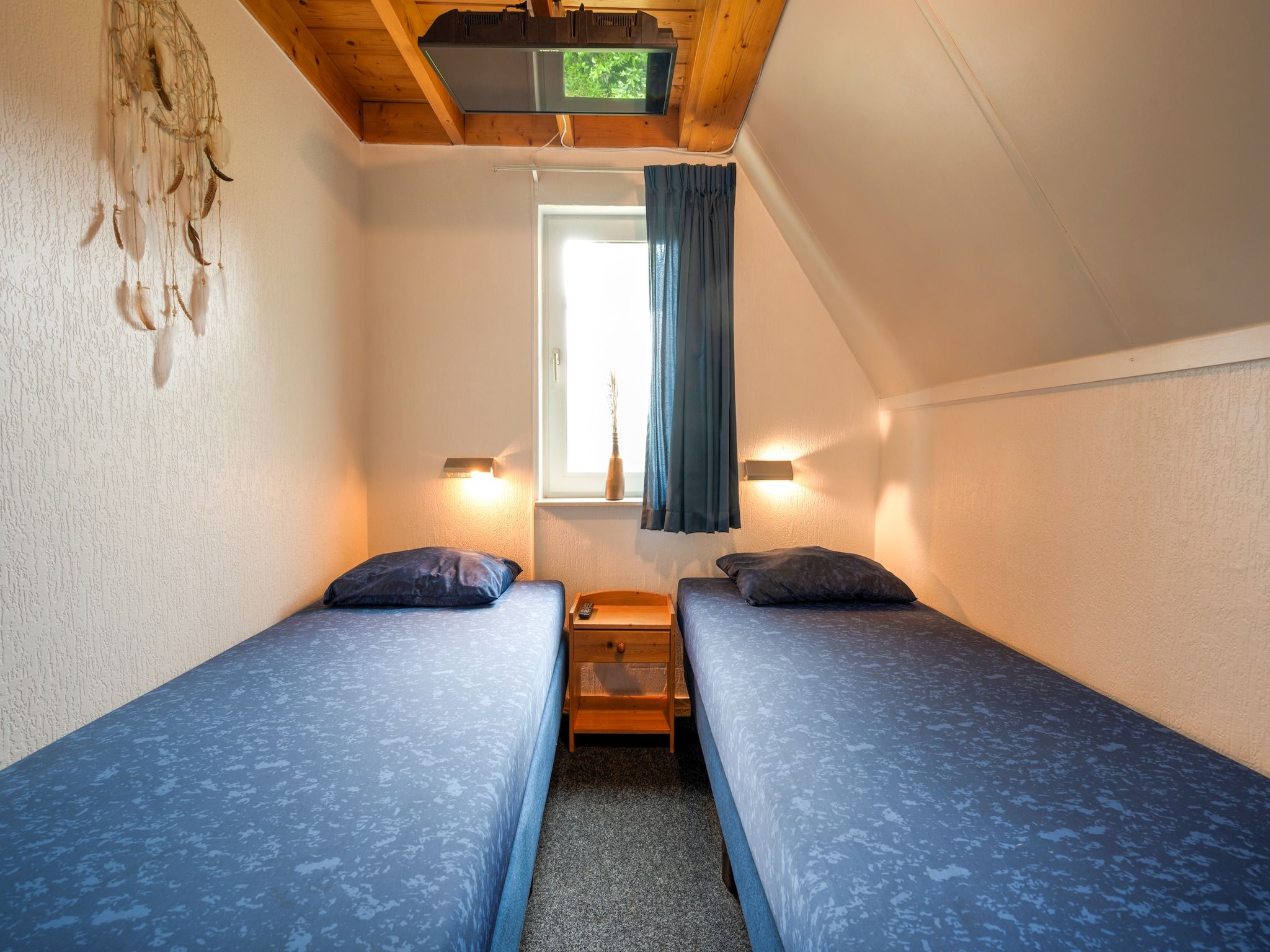 Een slaapkamer van Boslaan 1 in Gramsbergen