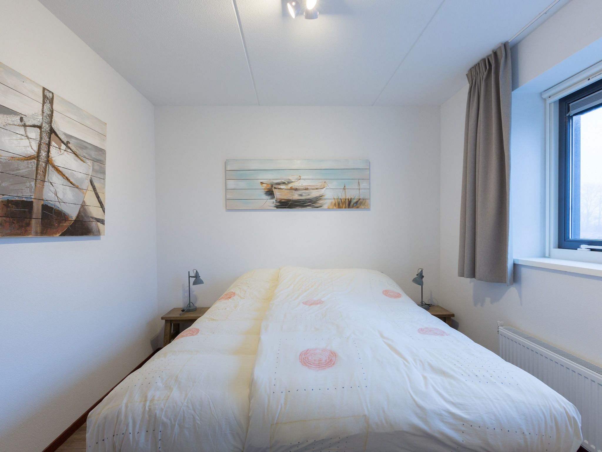 Een slaapkamer van Waterpark Langelille 2 in Langelille