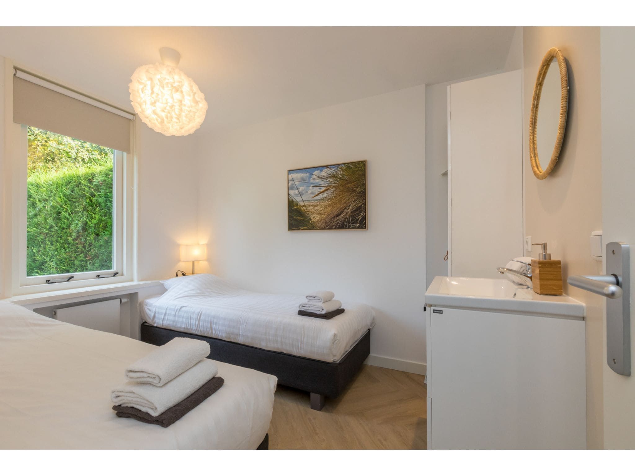 Een slaapkamer van Oosterpark 76 - Oostkapelle in Oostkapelle