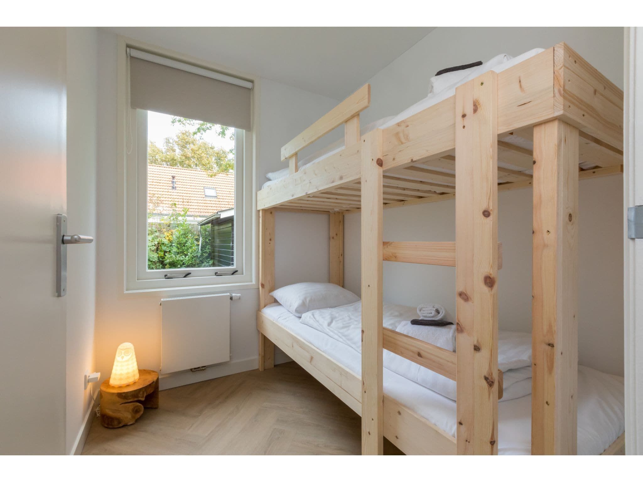 Een slaapkamer van Oosterpark 76 - Oostkapelle in Oostkapelle