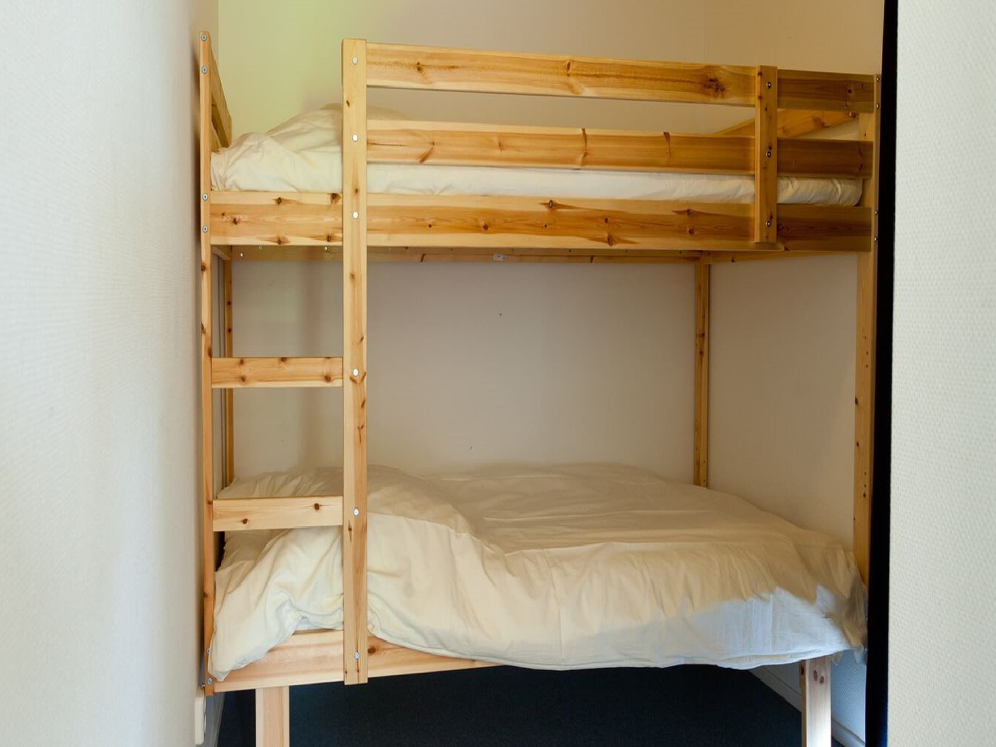 Een slaapkamer van Chalet Doutzen in De Veenhoop