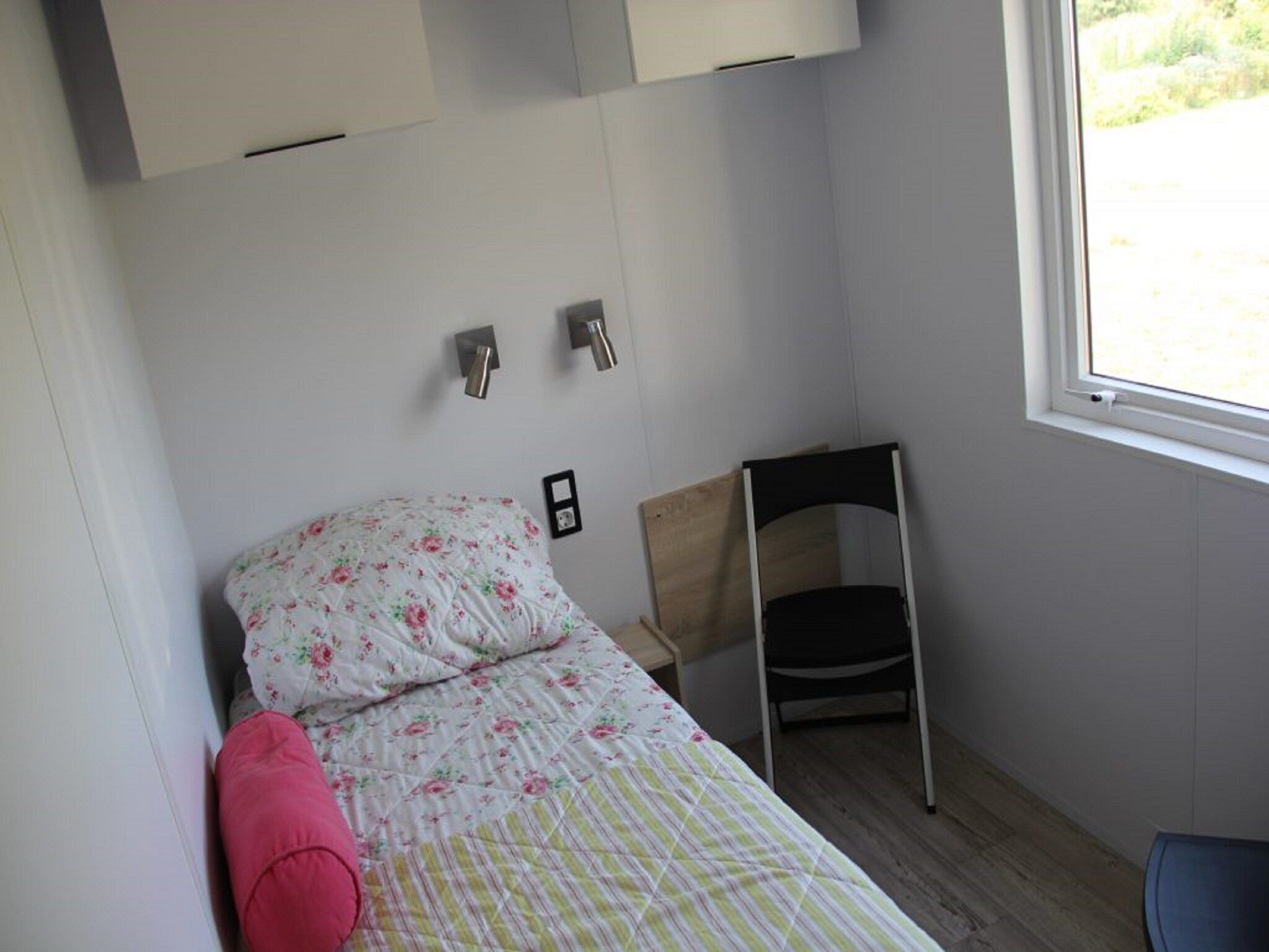 Een slaapkamer van Chalet Eke in De Veenhoop