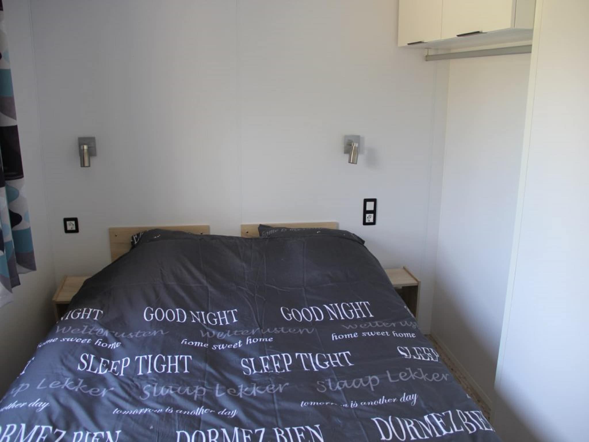 Een slaapkamer van Chalet Jildau in De Veenhoop