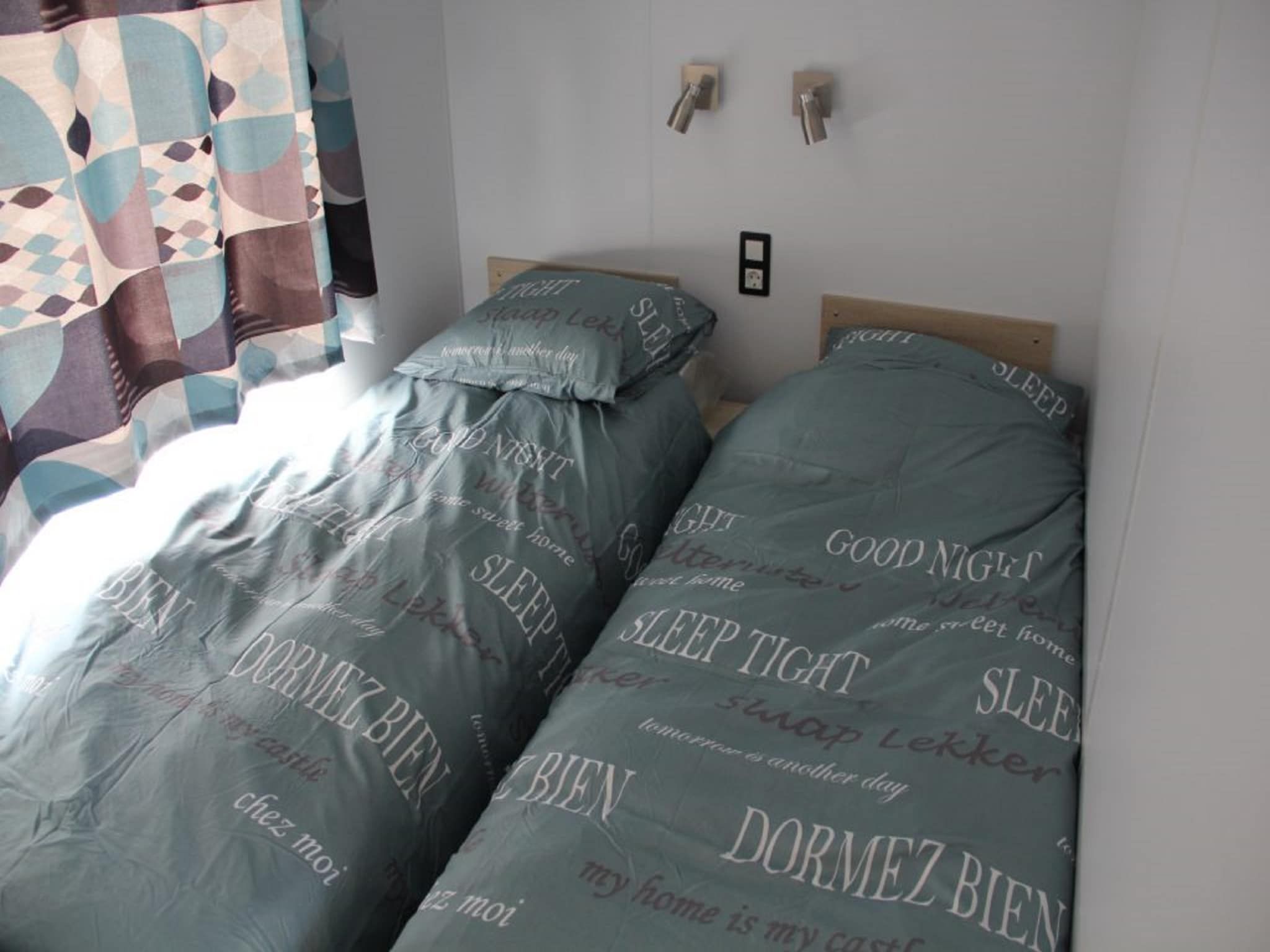 Een slaapkamer van Chalet Jildau in De Veenhoop