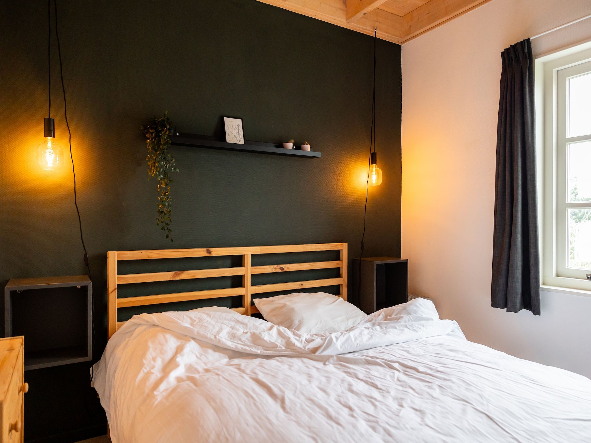 Een slaapkamer van Chalet Famke in De Veenhoop